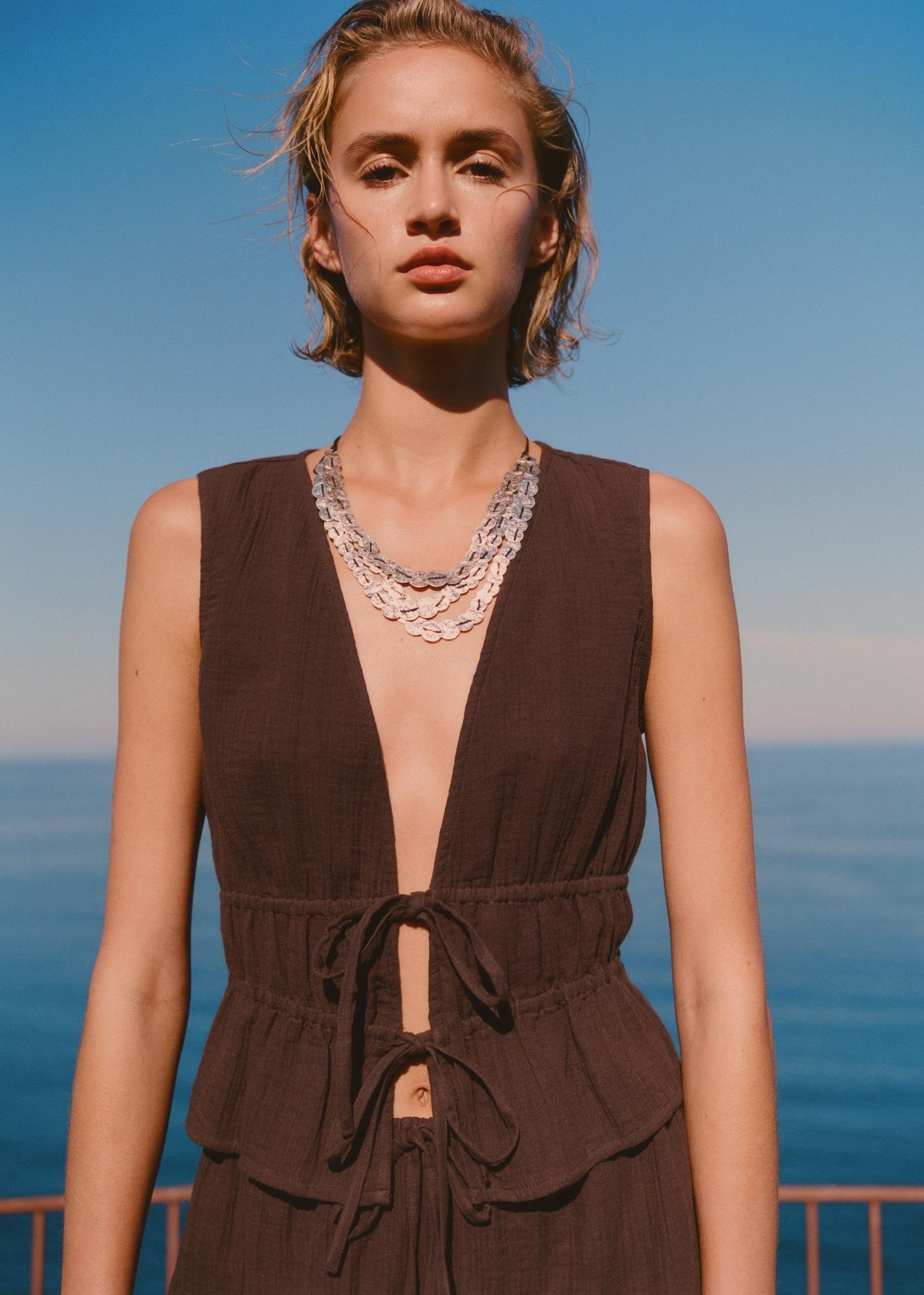 Ruffled top with bows - Women | MANGO USA Product Image