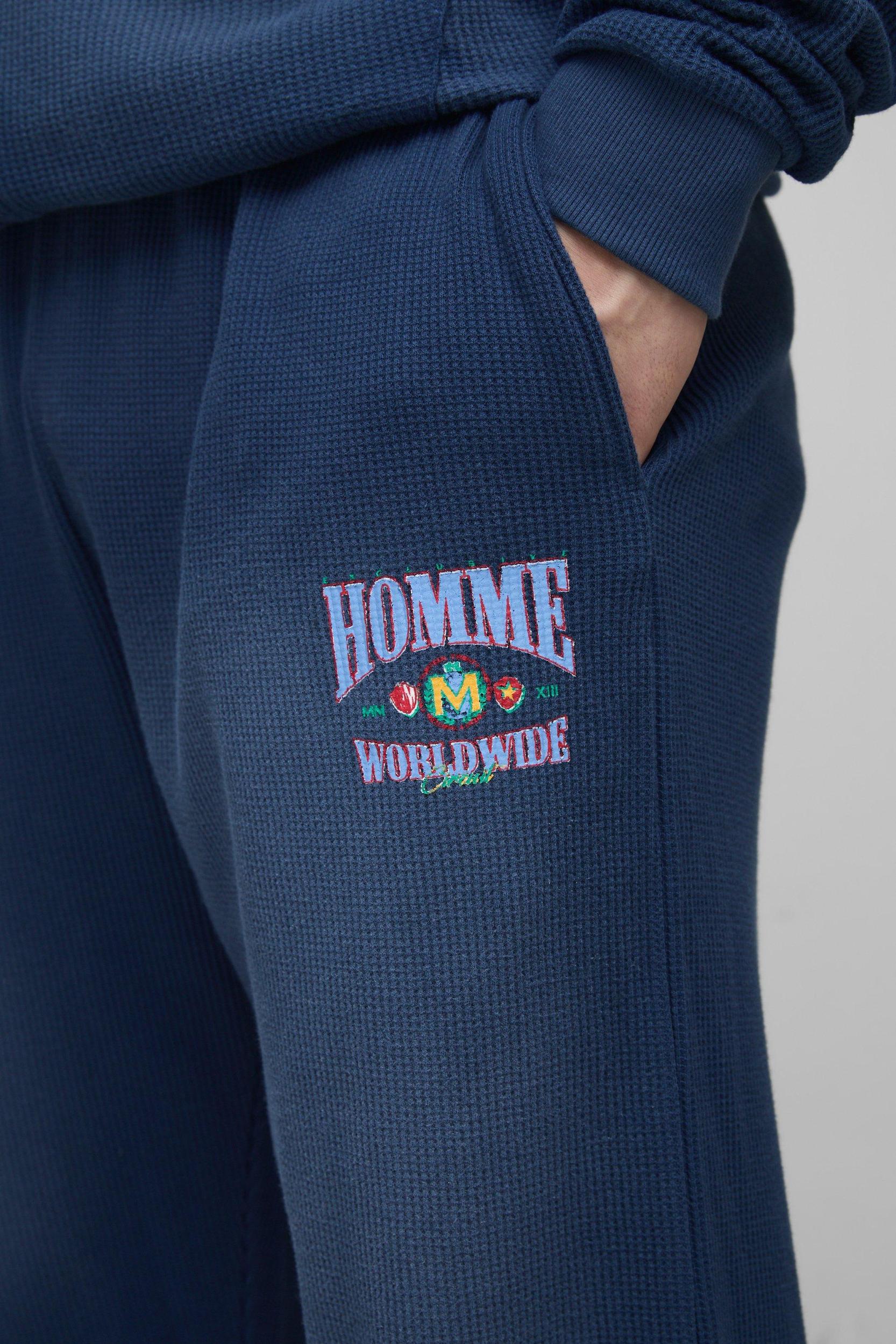 Tall Spray Wash Waffle Graphic Oversized Sweatpants | boohooMAN USA Product Image