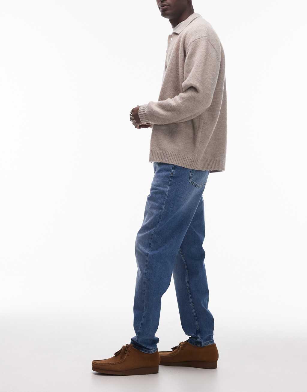 Topman stretch tapered jeans in mid wash blue Product Image