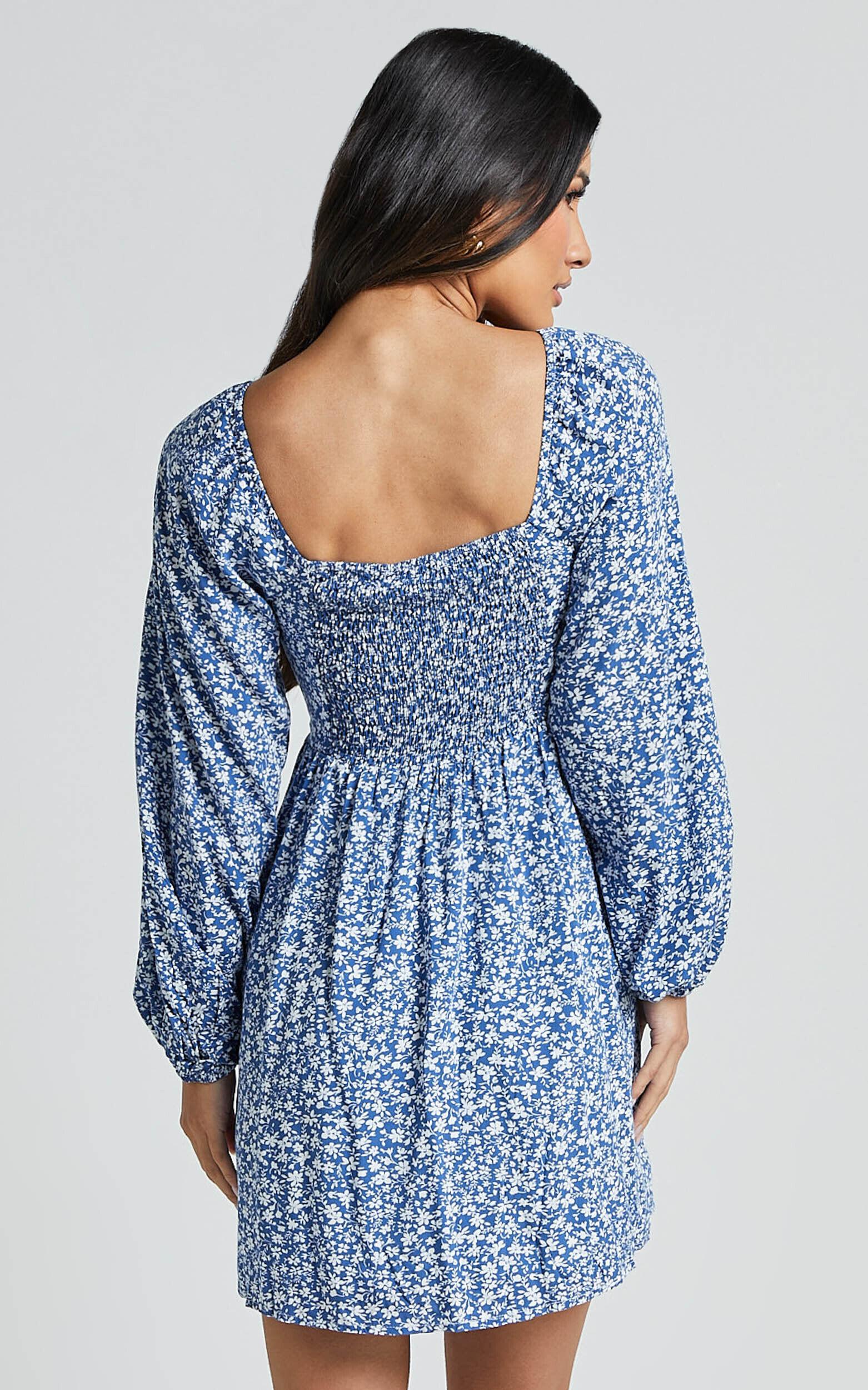 Ellison Mini Dress - 3/4 Sleeve Twist Bodice Dress in Blue Floral Product Image