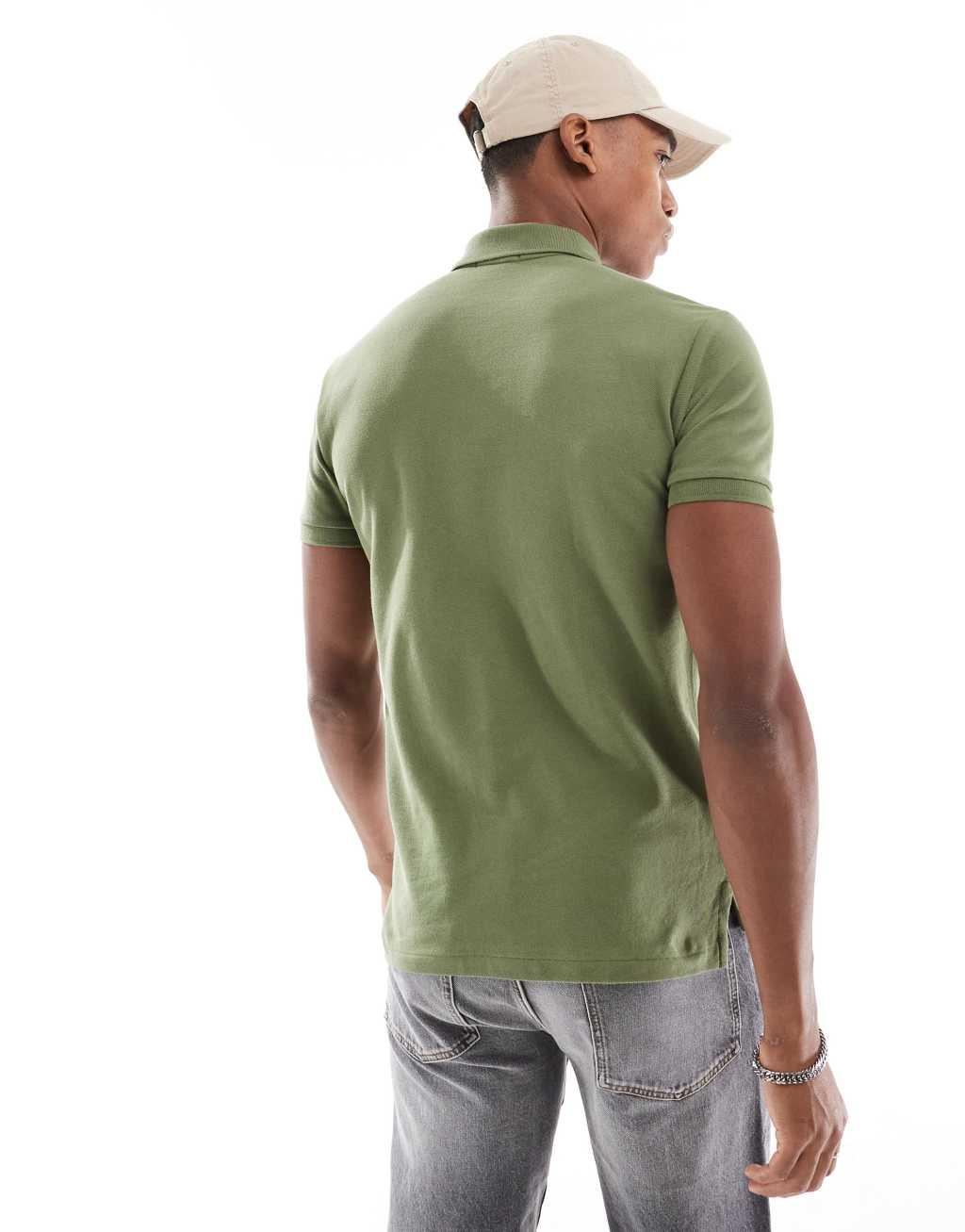 Polo Ralph Lauren icon logo slim fit pique polo in mid green Product Image