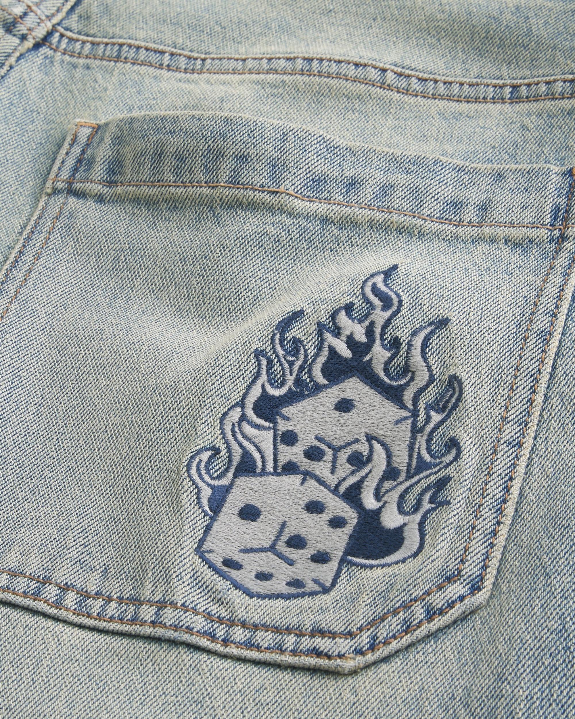 Light Wash Embroidered Dice Skater Baggy Jeans Product Image