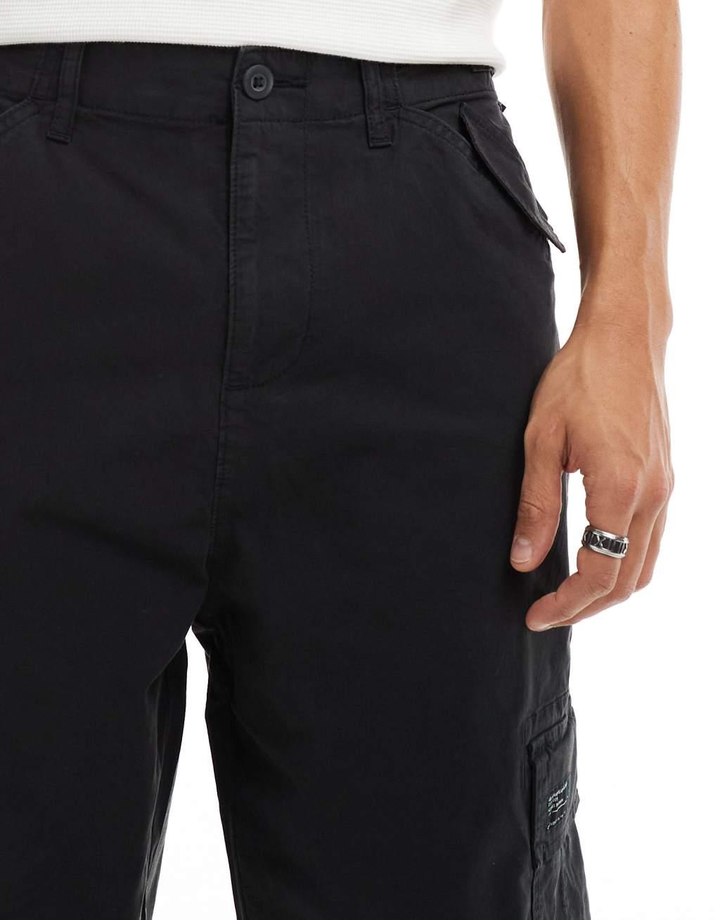 ASOS DESIGN oversized tapered cargo pants with patch in black | ASOS Product Image