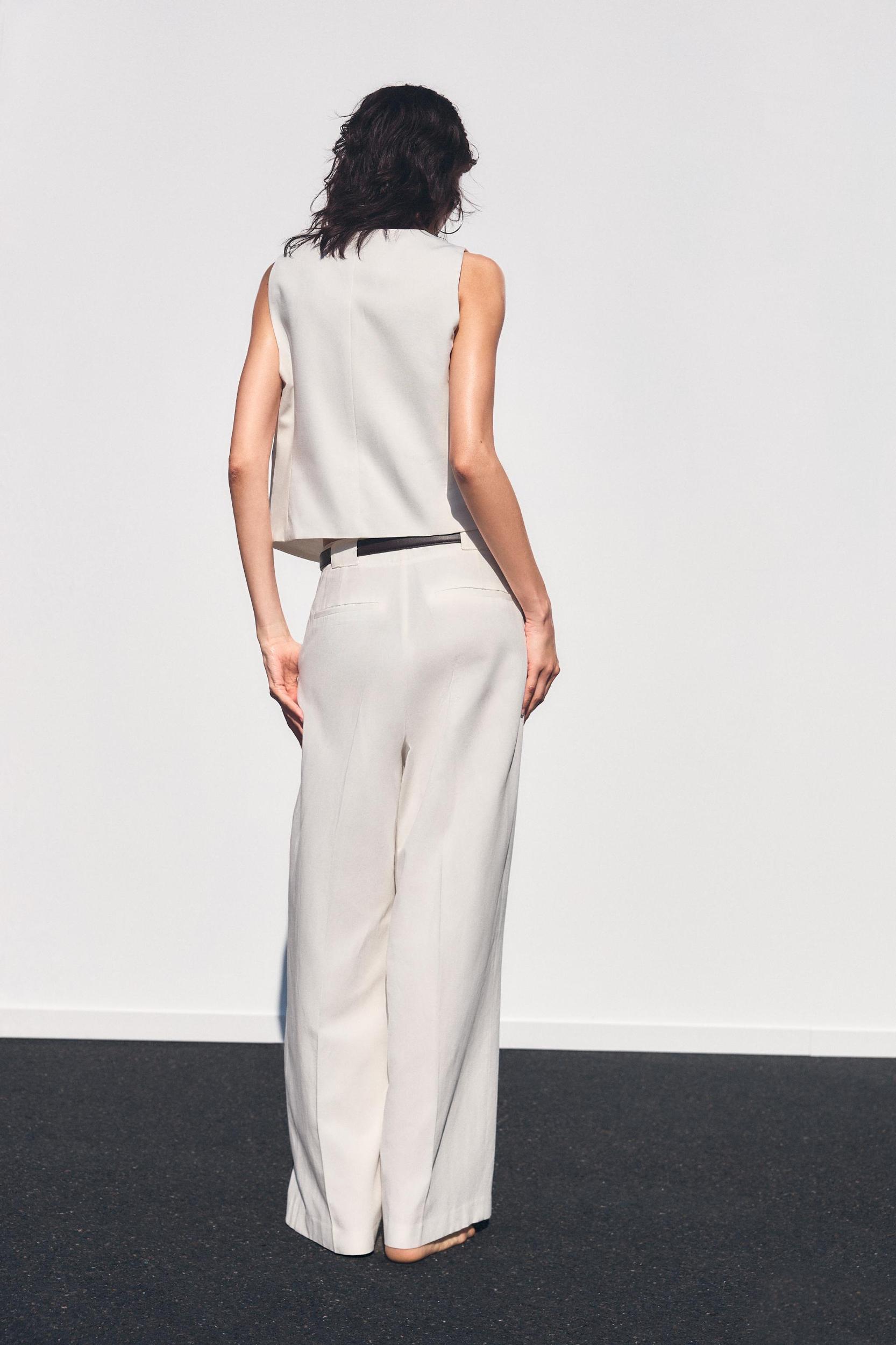 BELTED PLEATED PANTS Product Image