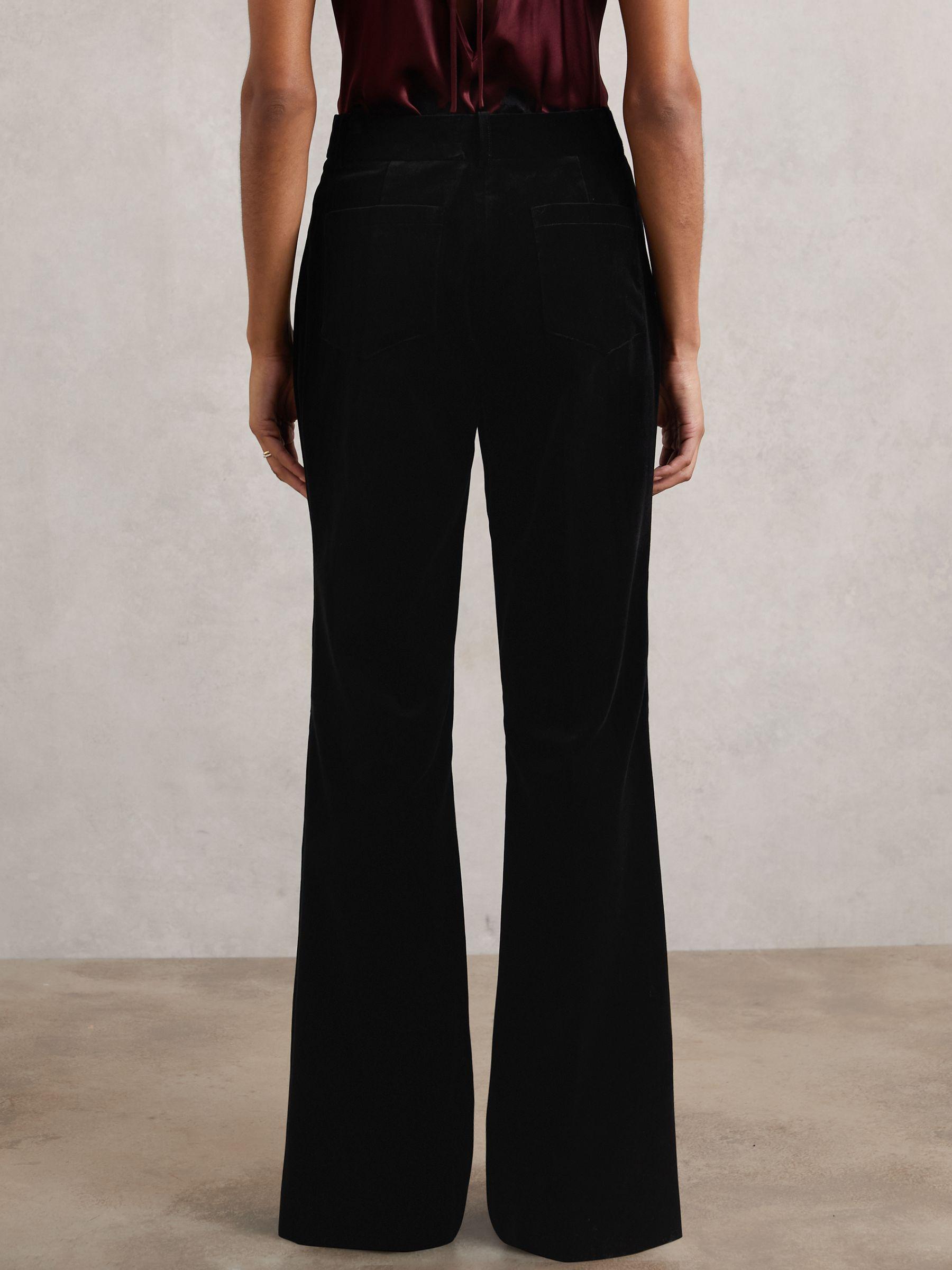 Petite Velvet Flared Trousers in Black Product Image