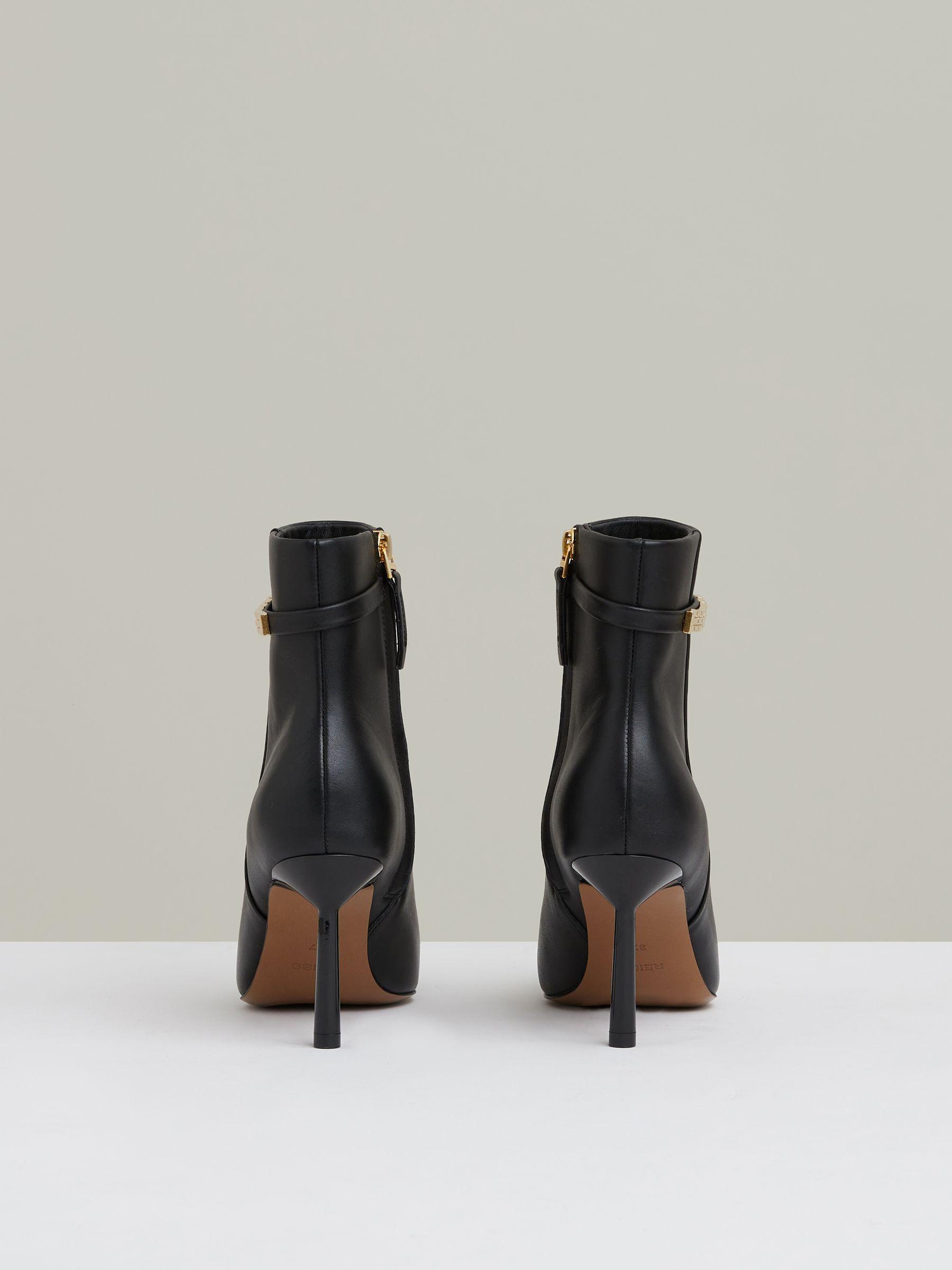 Leather Chain Embellished Ankle Boots in Black Product Image