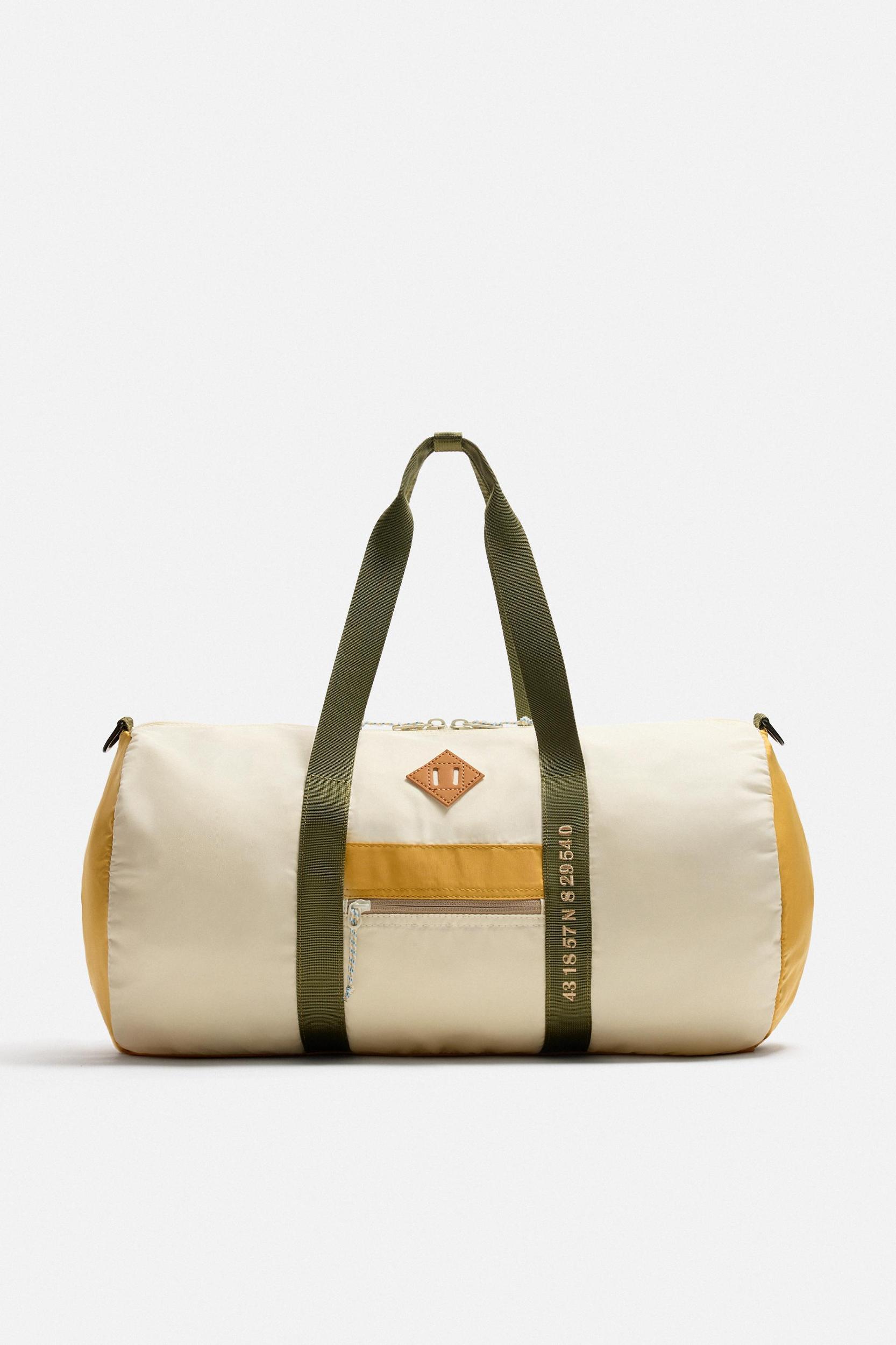 CONTRAST TRAVEL BAG Product Image