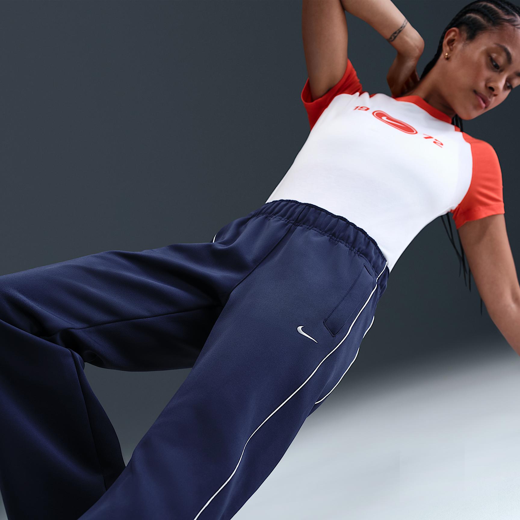 Womens Nike Sportswear Windrunner Mid-Rise Slim Knit Pants | HJ1016-410 Product Image