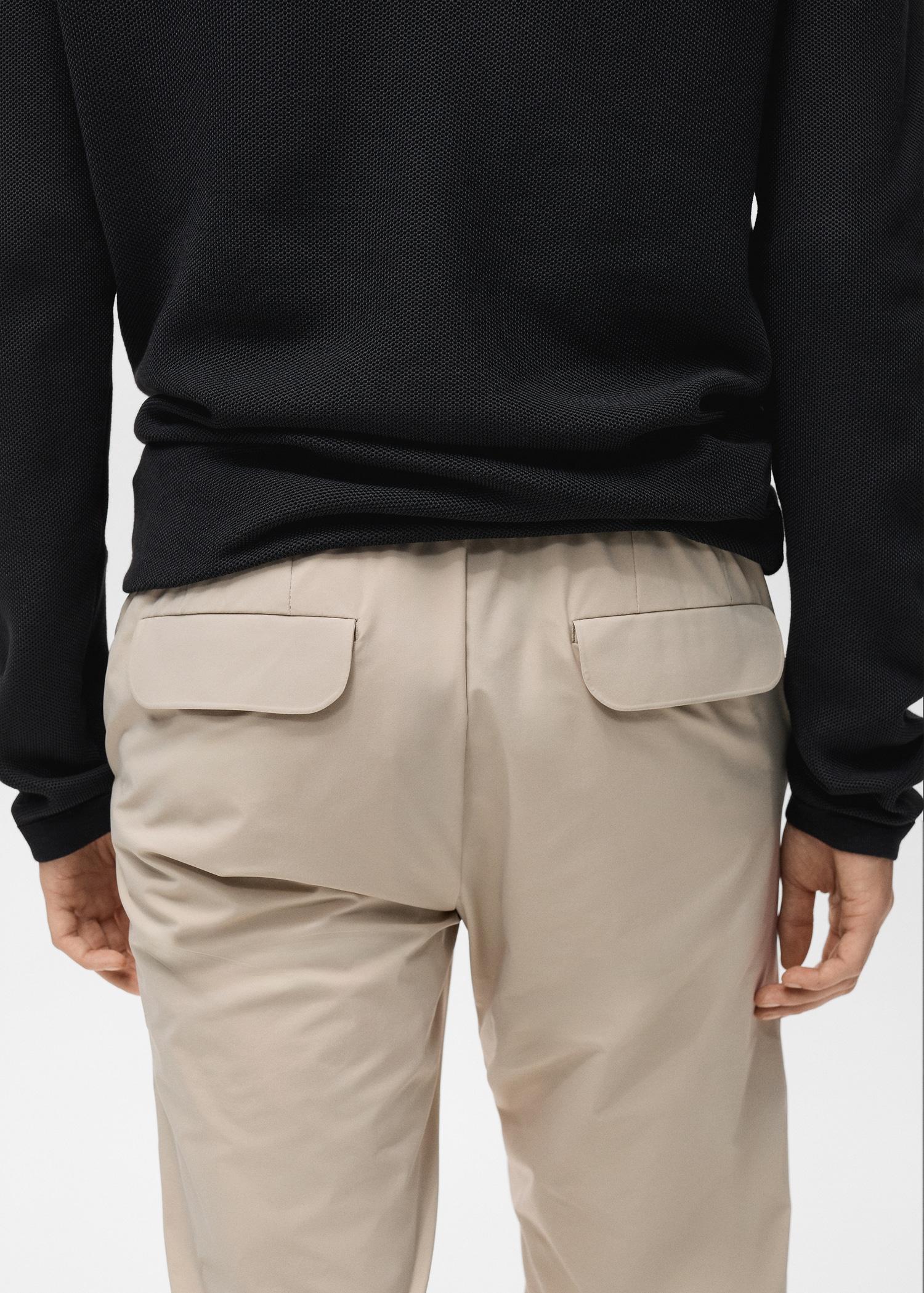 Stretch fabric slim-fit pants with drawstring - Men | MANGO USA Product Image