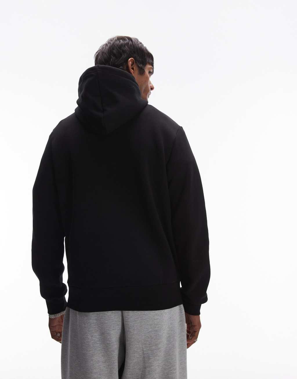 Lacoste pull over hoodie in black  Product Image