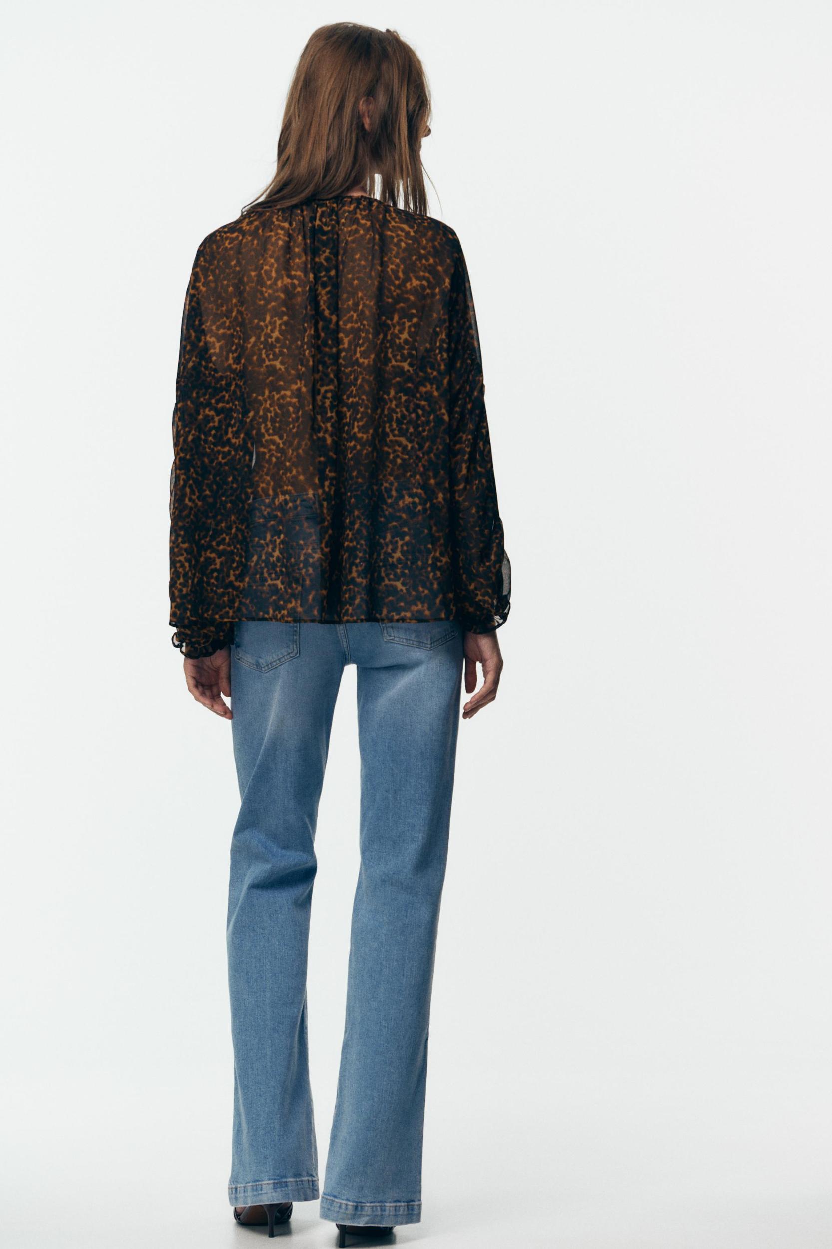 ANIMAL PRINT SEMI-SHEER BLOUSE Product Image