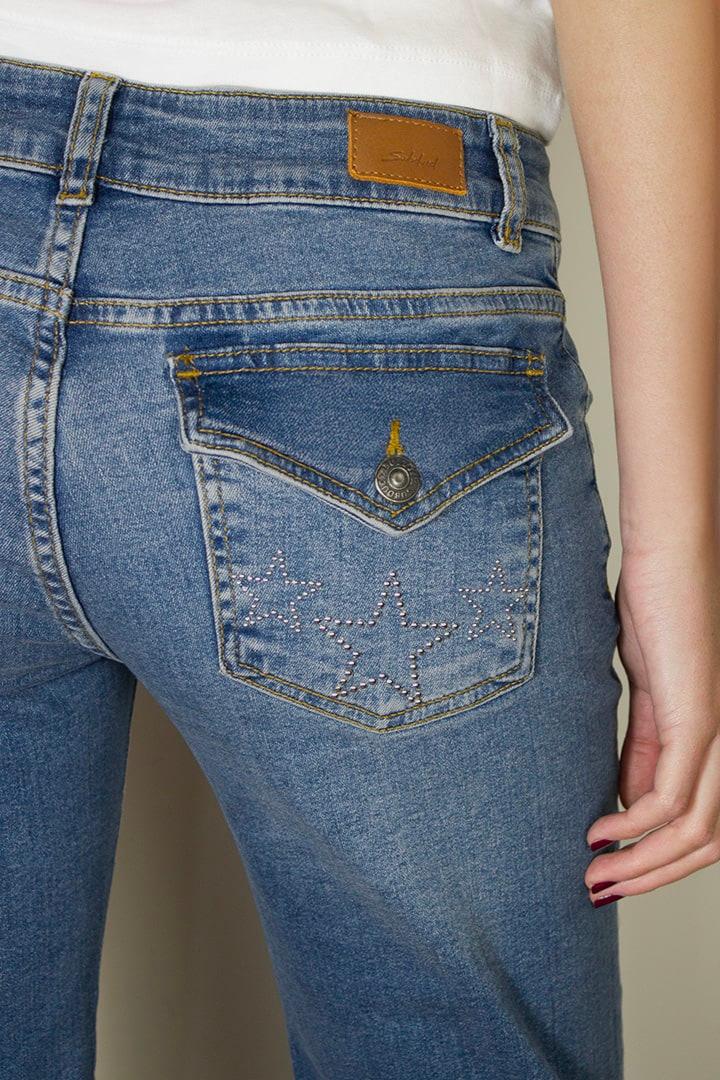 Low waist flared jeans with stars studs Product Image