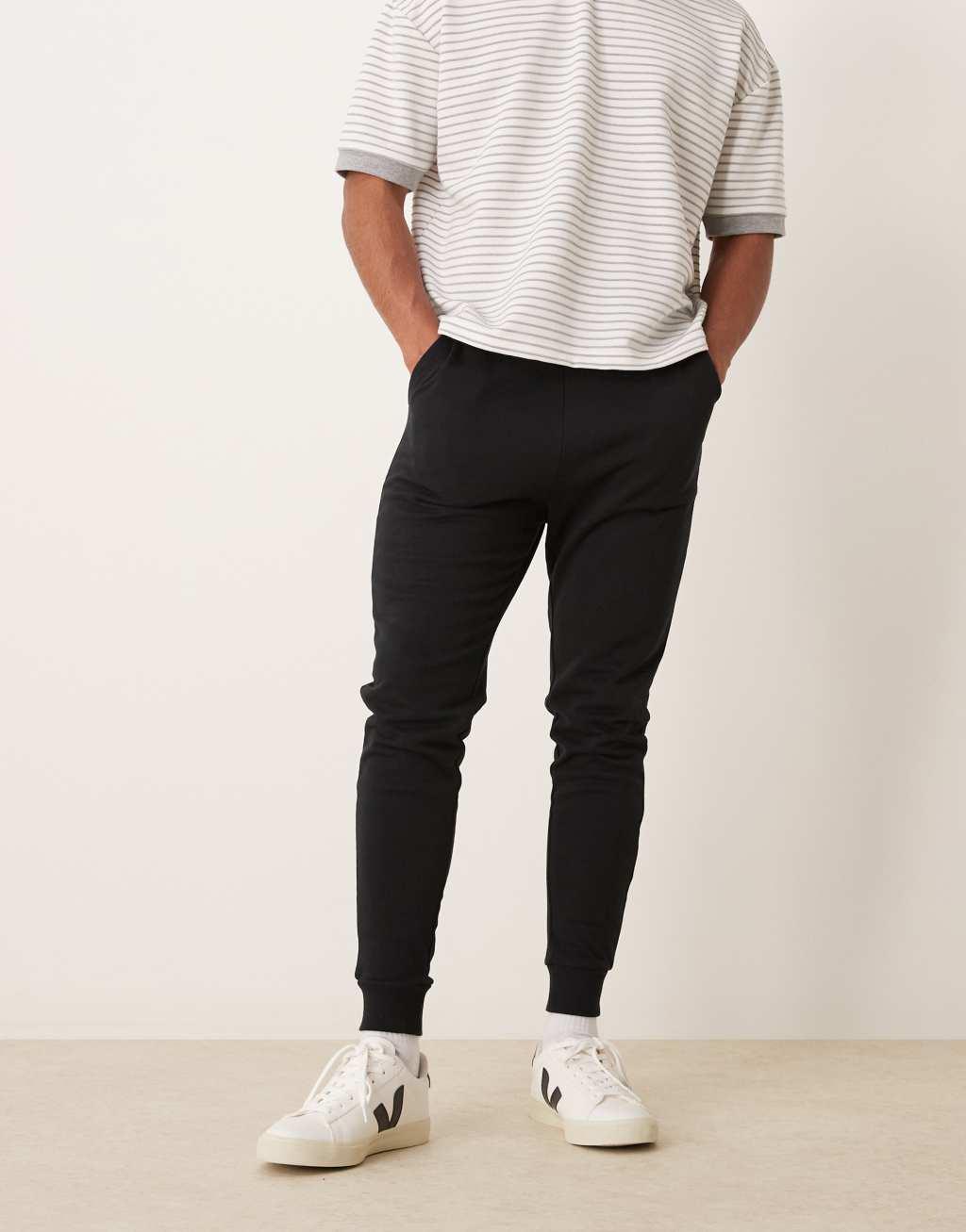 ASOS DESIGN essential skinny sweatpants in black Product Image