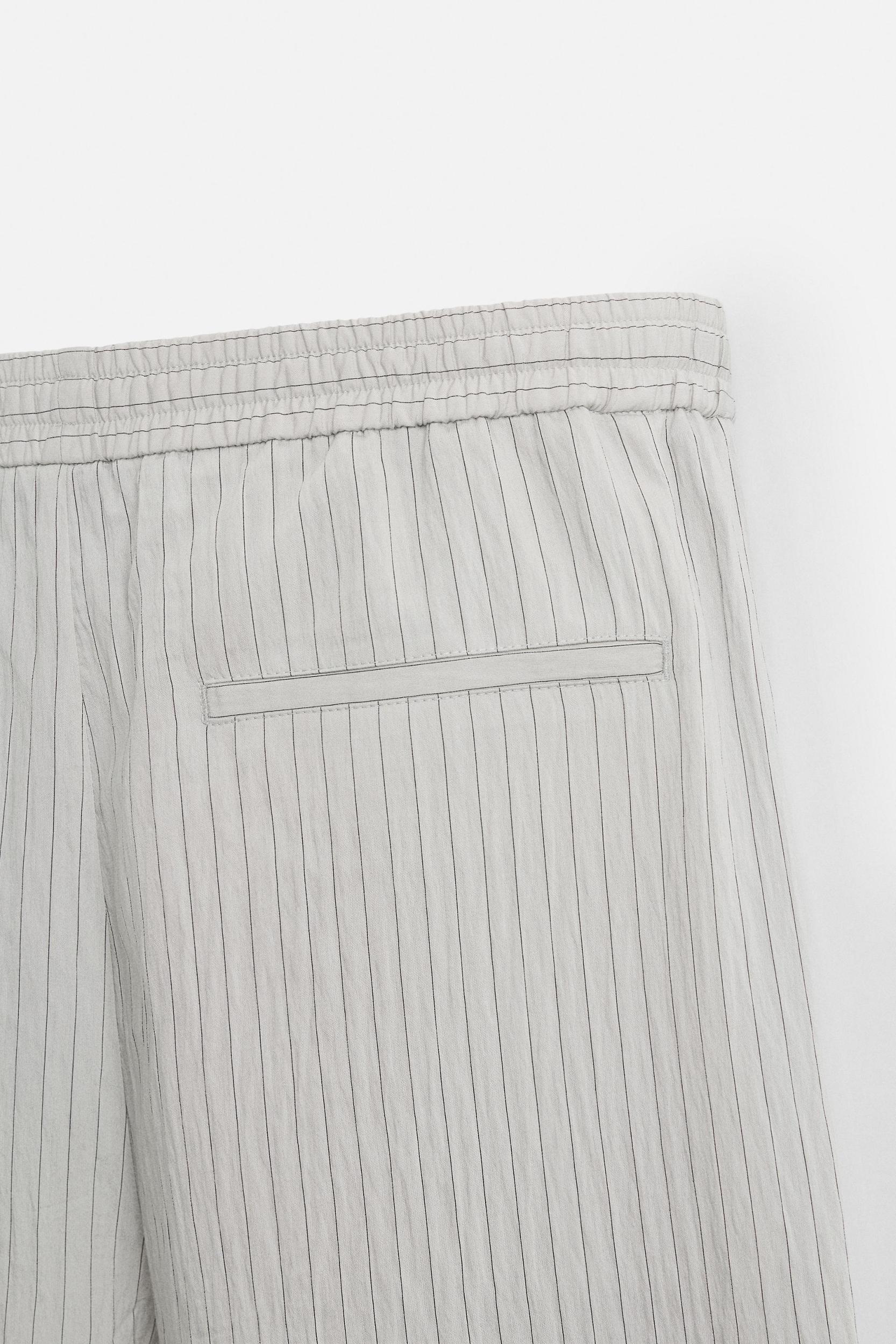 STRIPED FLOWY PANTS Product Image