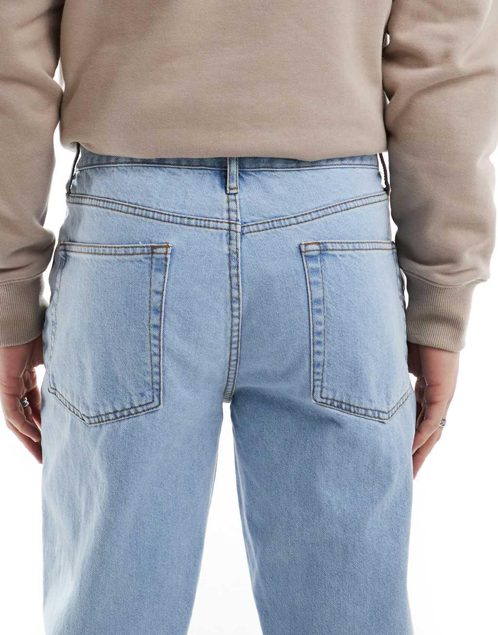 ASOS DESIGN straight leg jeans in light wash blue Product Image