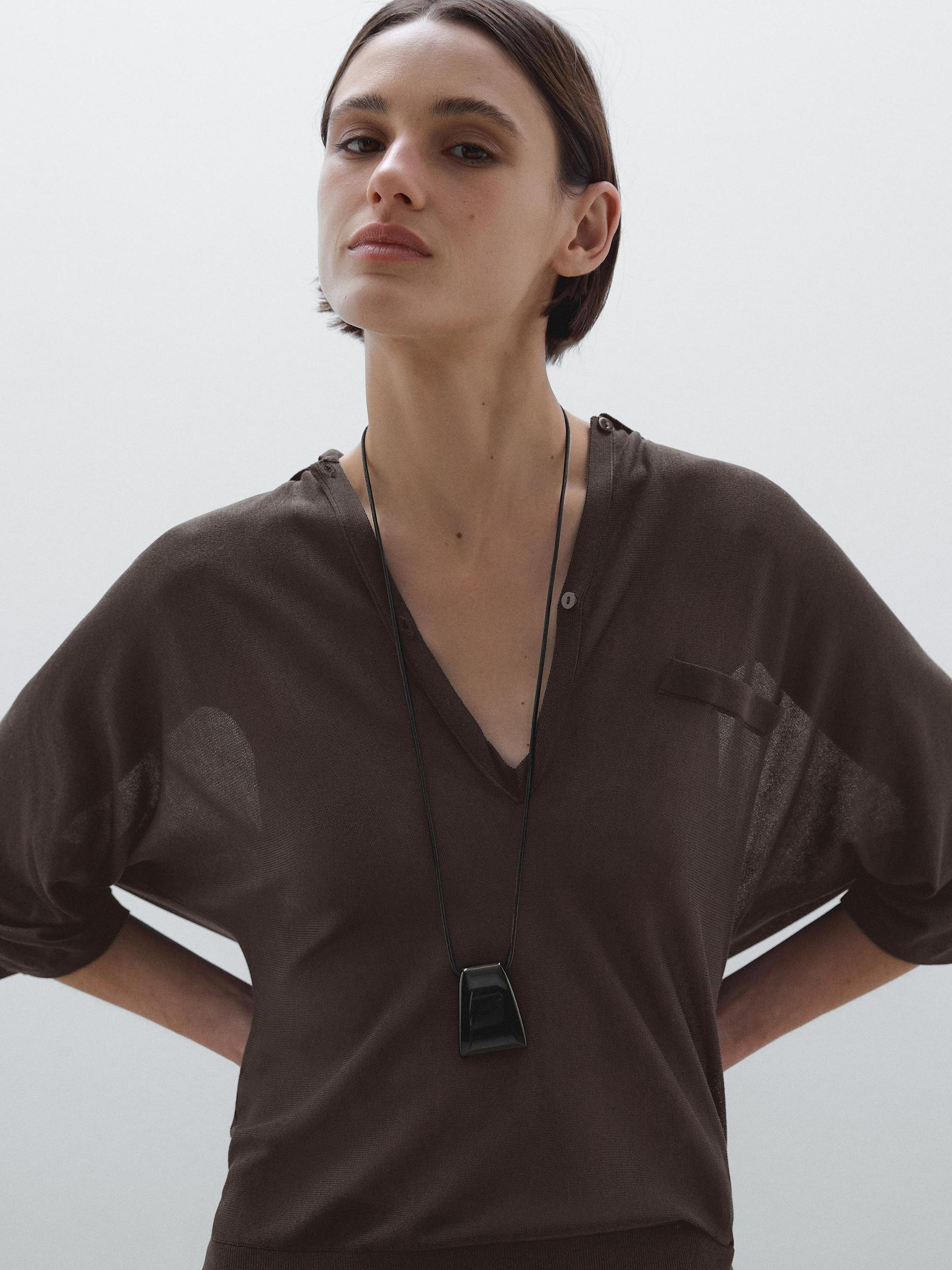 Flowing cape-style polo shirt Product Image