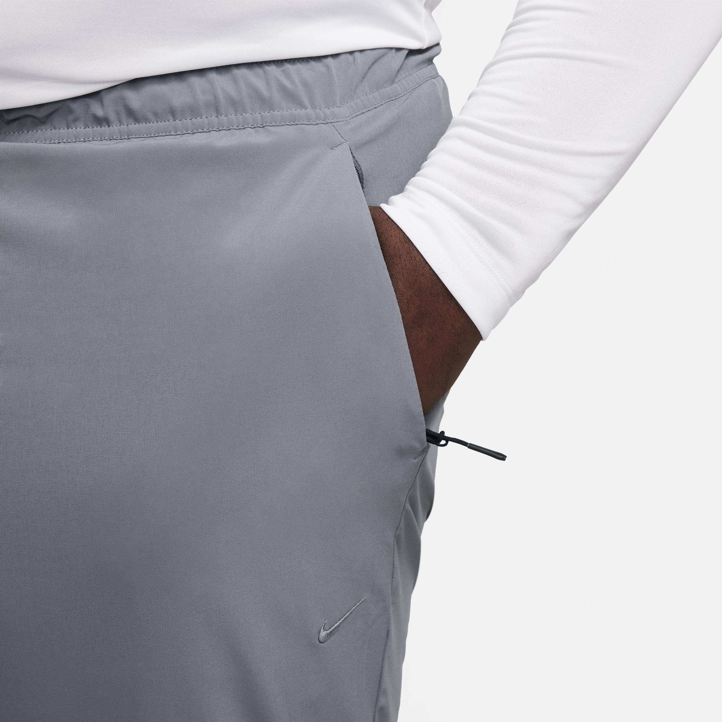 Nike Mens Unlimited Dri-FIT Tapered Leg Versatile Pants | FB7546-084 Product Image