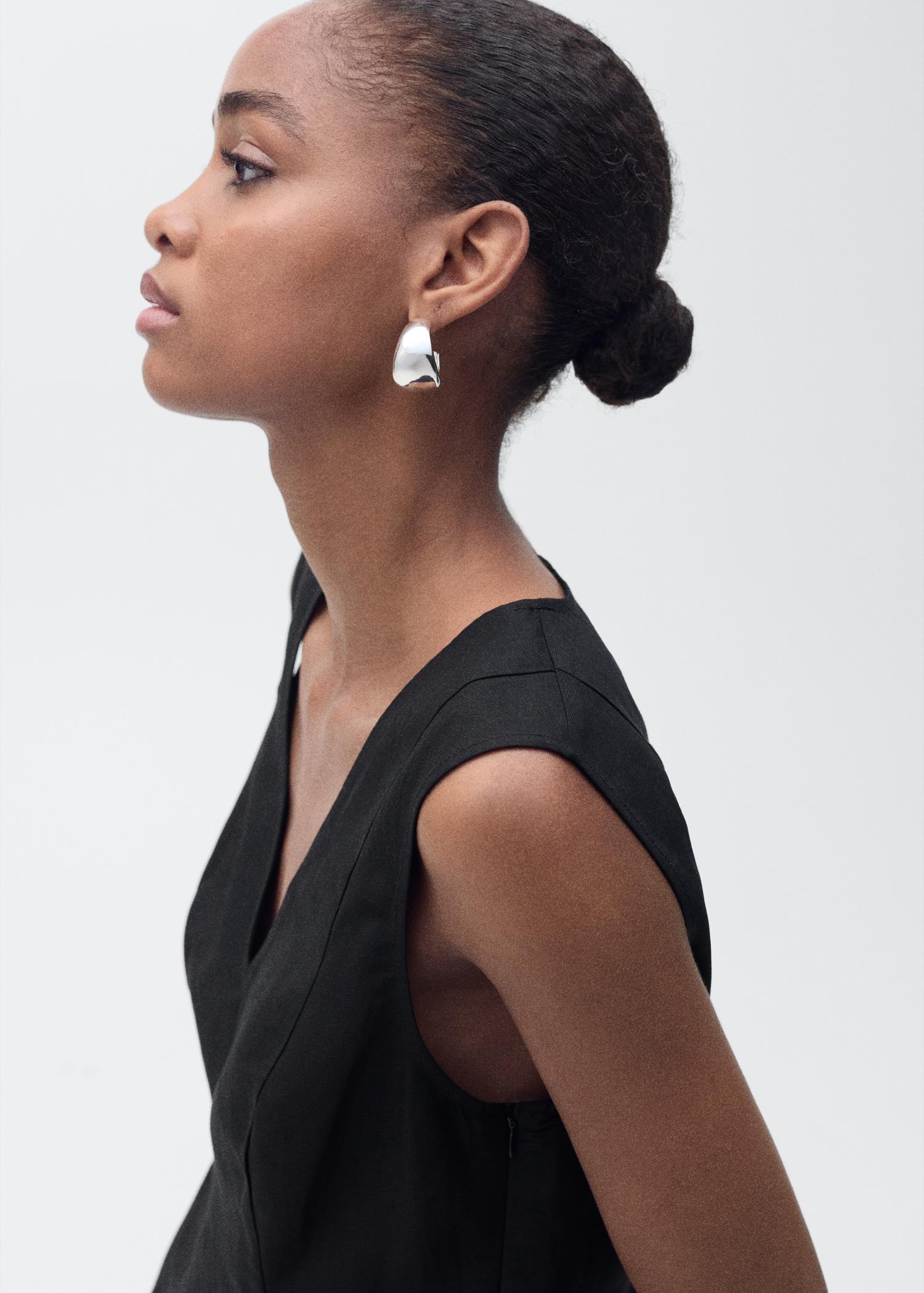 Linen-blend peplum top - Women | MANGO USA Product Image