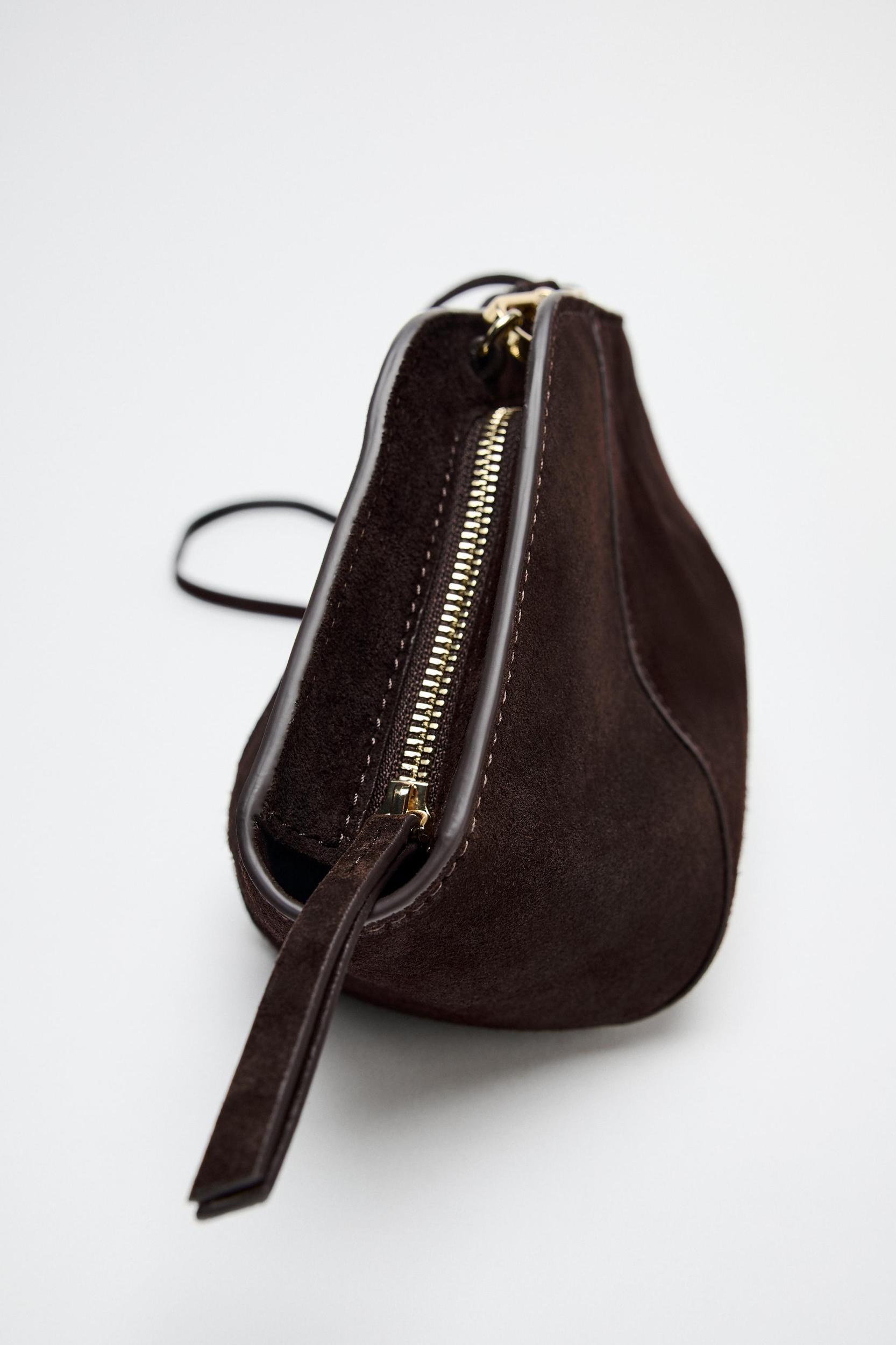 SPLIT LEATHER TOPSTITCH CLUTCH Product Image