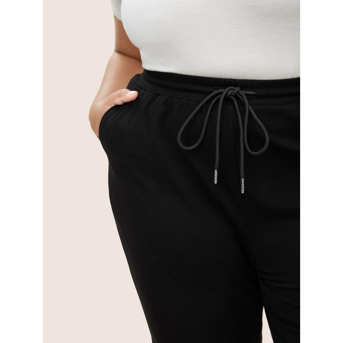 Plus Size Plain Drawstring Waist Tapered Pants Women Black Casual High Rise Everyday Pants BloomChic 18-20/2X Product Image