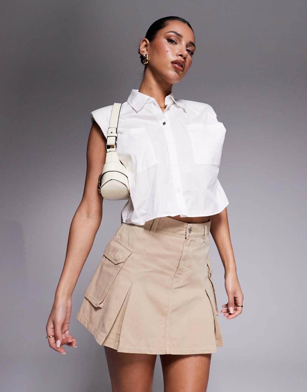 HUGO Blue pleated mini skirt with pockets in beige Product Image
