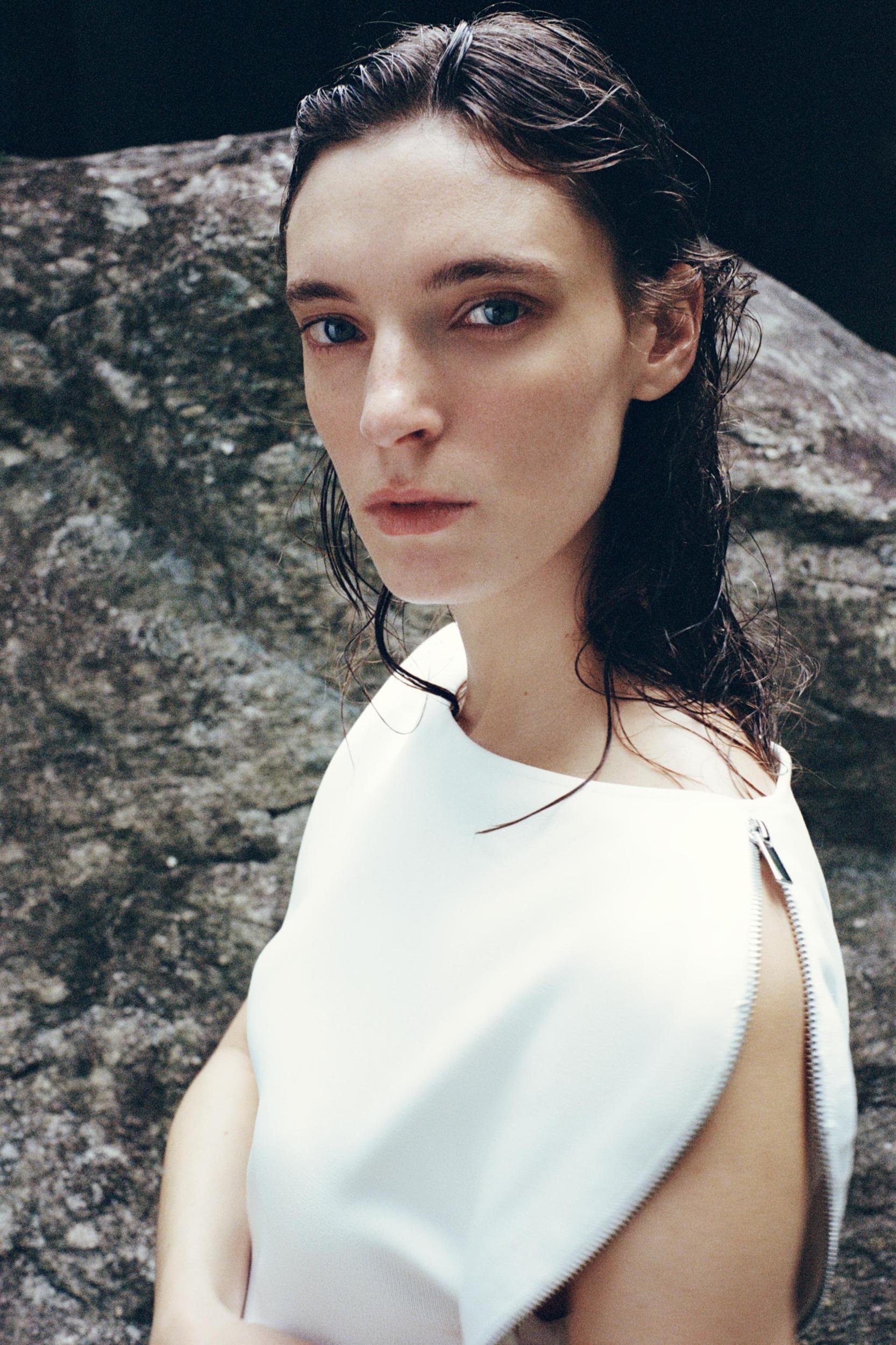 ZIPPER SLEEVE KNIT TOP Product Image