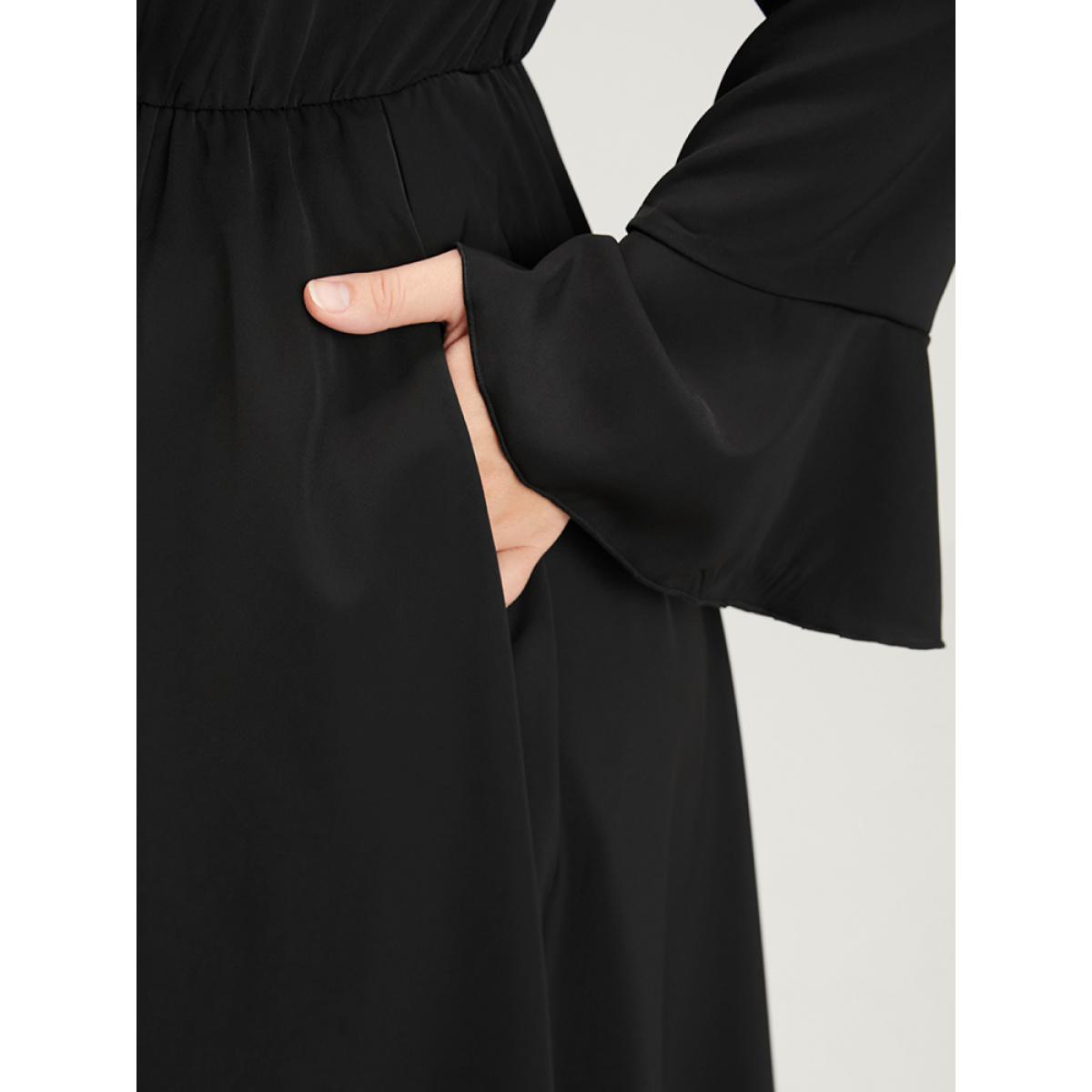 Plus Size Solid Bell Sleeve Pocket Knotted Neck Arc Hem Dress Black Women Elegant Cross straps V-neck Long Sleeve Curvy Long Dress BloomChic 26/4X Product Image