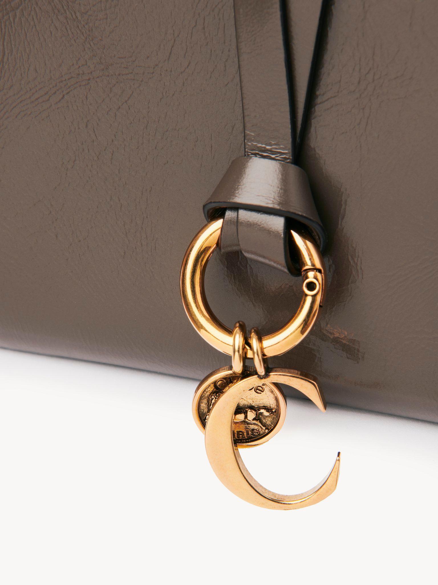 Alphabet bifold wallet in shiny leather Product Image