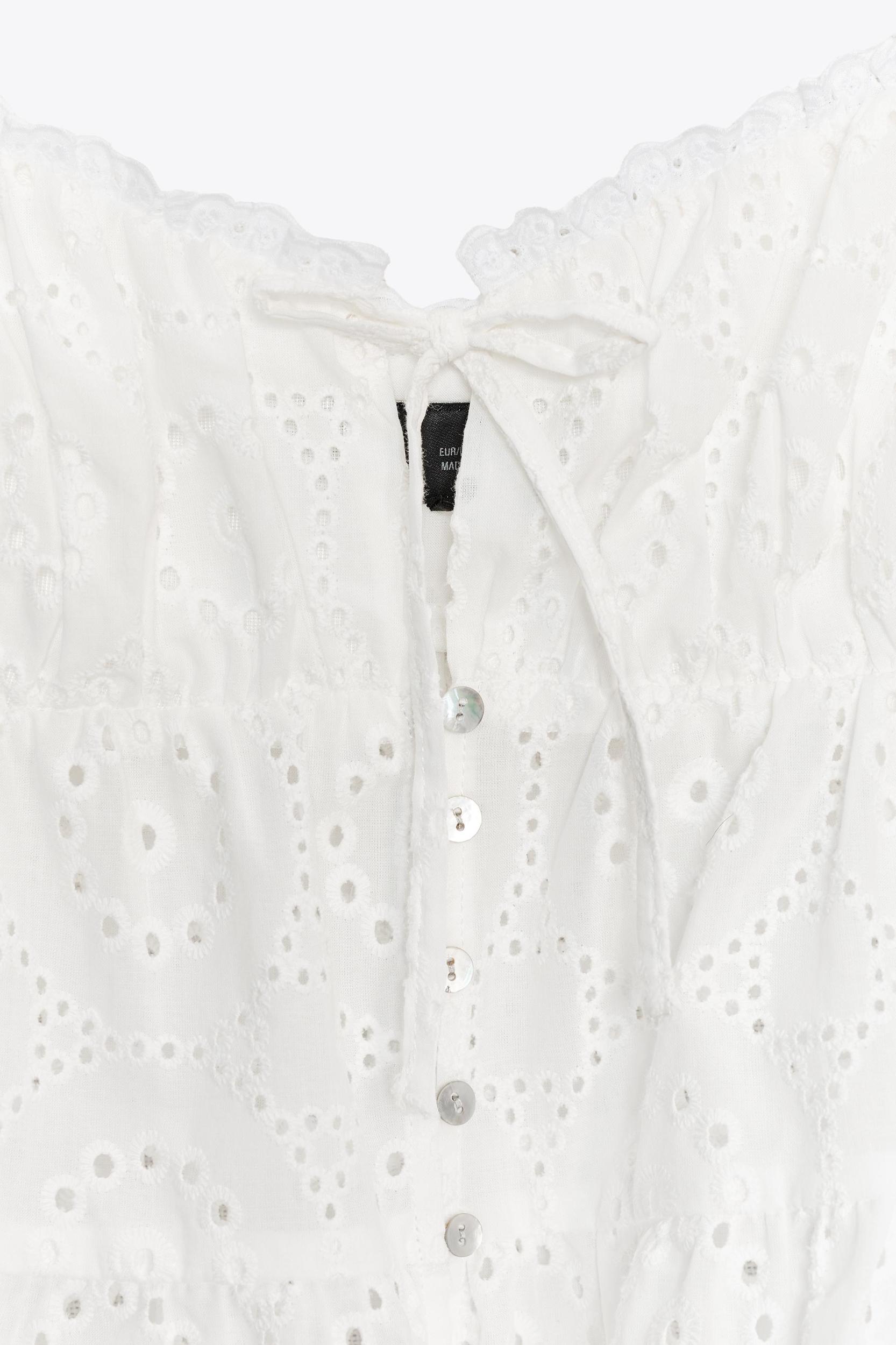 EMBROIDERED EYELET TOP Product Image