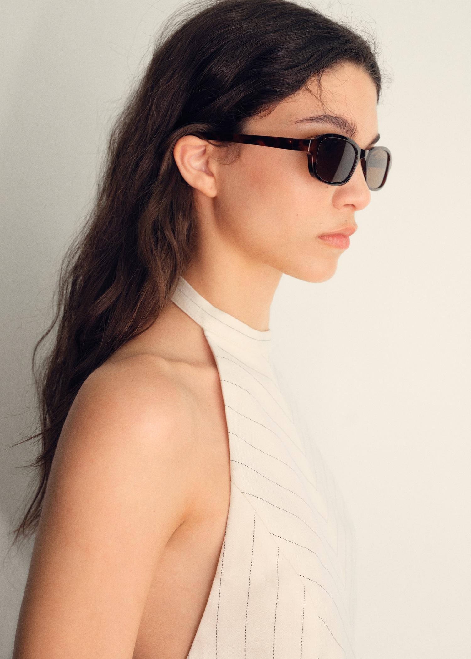 Striped halter-neck top - Women | MANGO USA Product Image