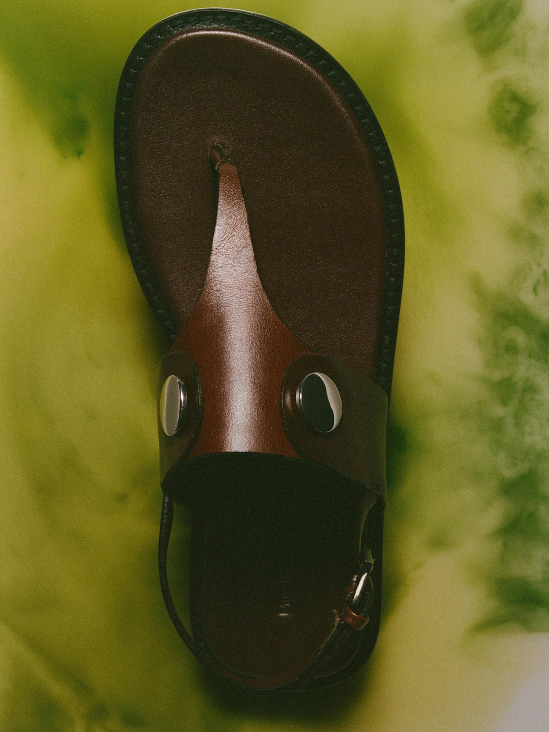 Flat sandals with buttons Product Image