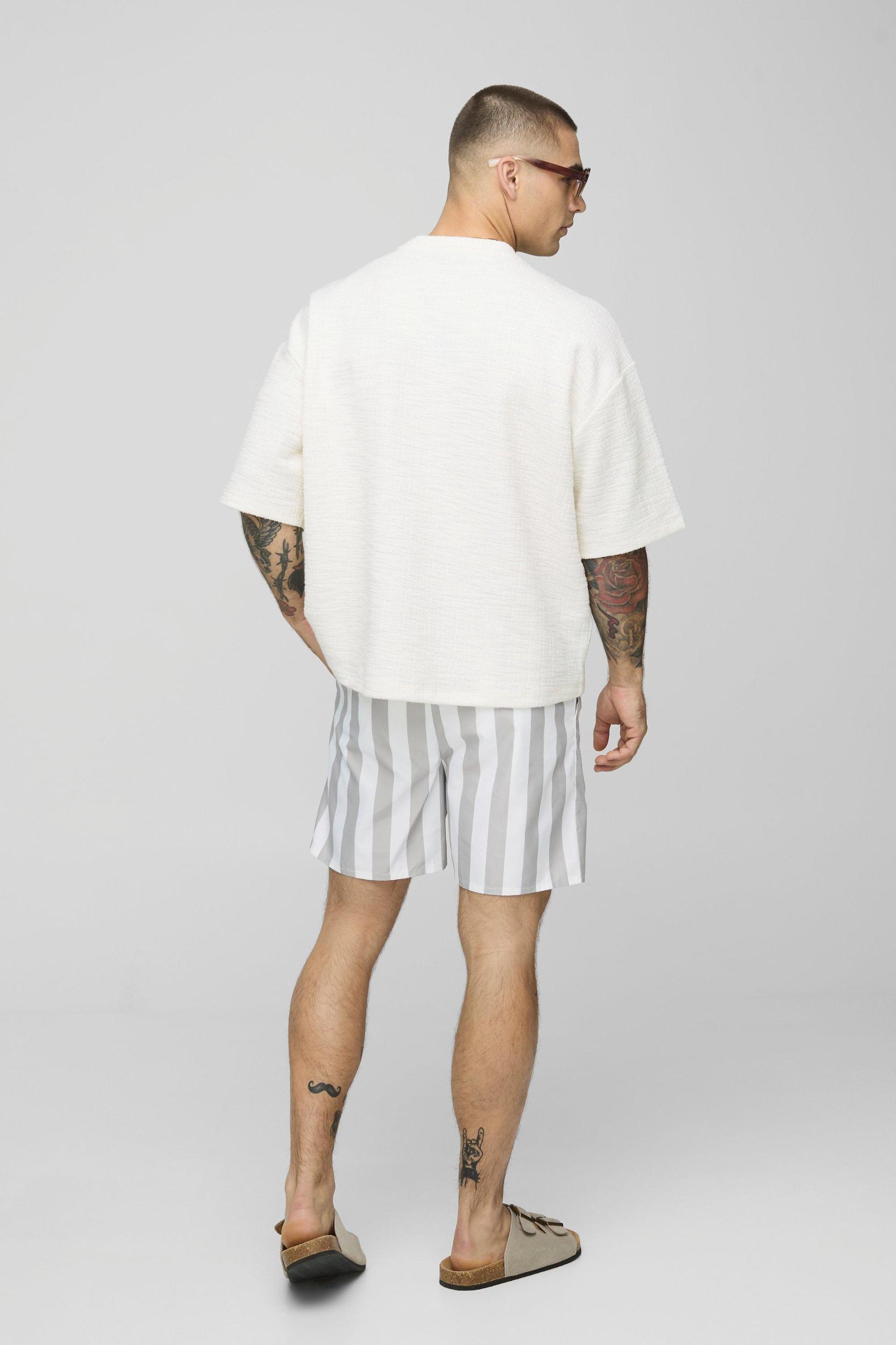 Wide Stripe Print Mid Length Swim Trunks | boohooMAN USA Product Image