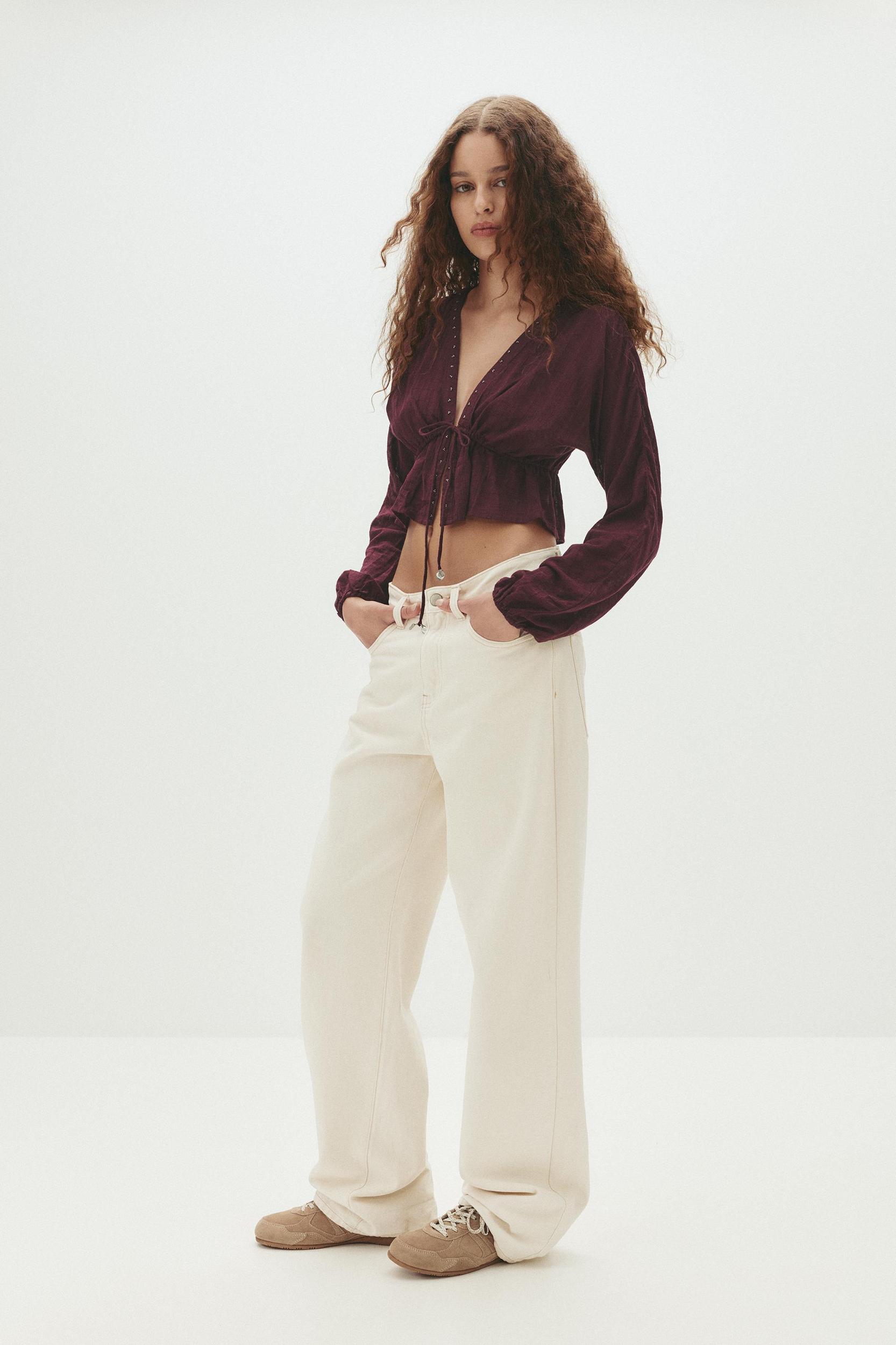 Beaded blouse with bow Product Image