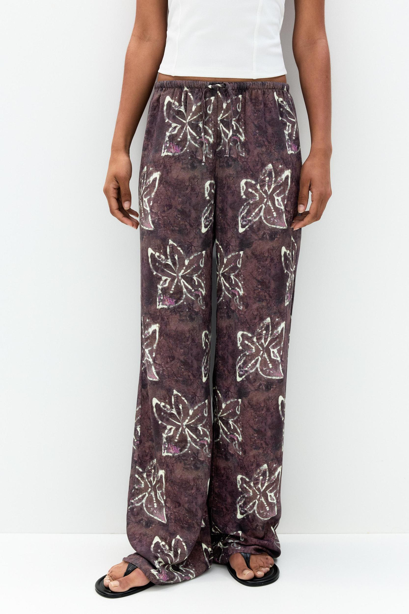 Loose-fitting floral print pants Product Image