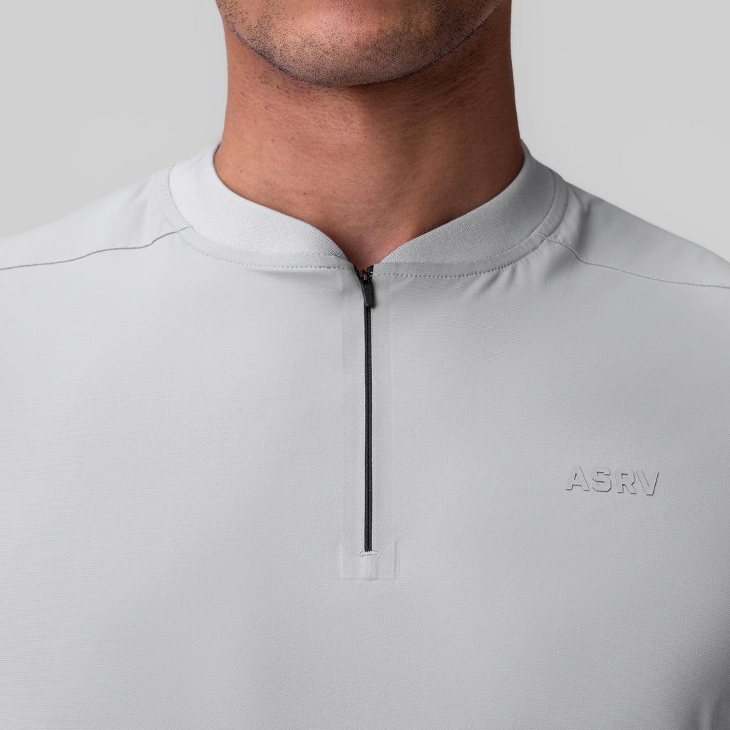 1087. Tetra-Lite® Ice Zip Tee - Light Sky Product Image