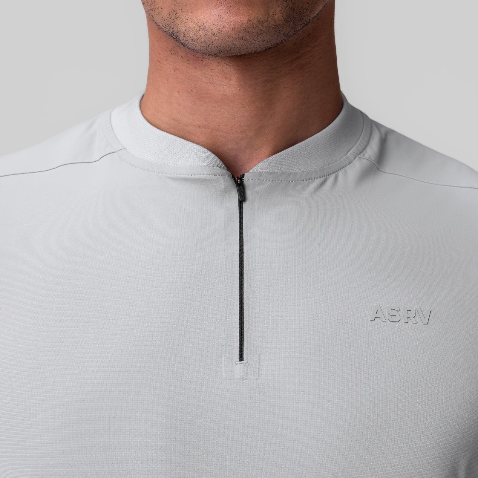 1087. Tetra-Lite® Ice Zip Tee - Light Sky Product Image