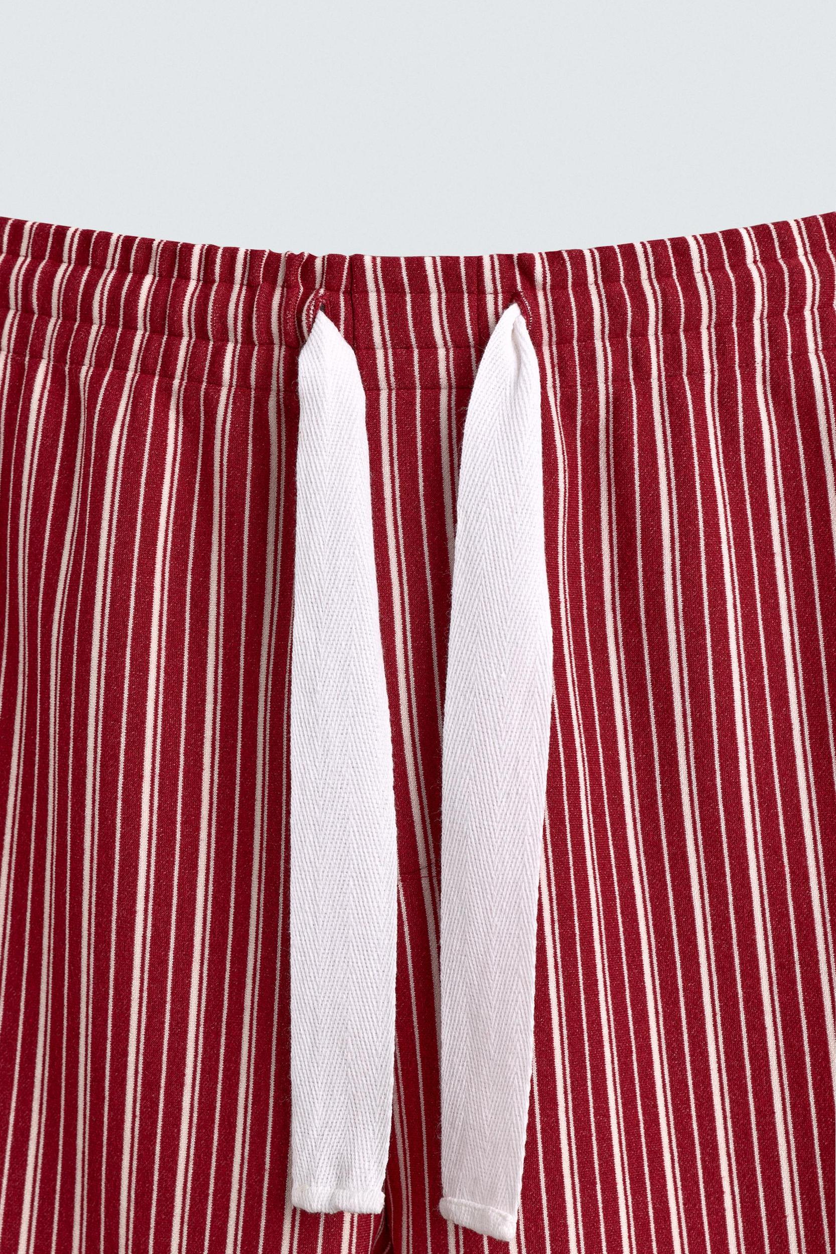 STRIPED RELAXED FIT PANTS Product Image