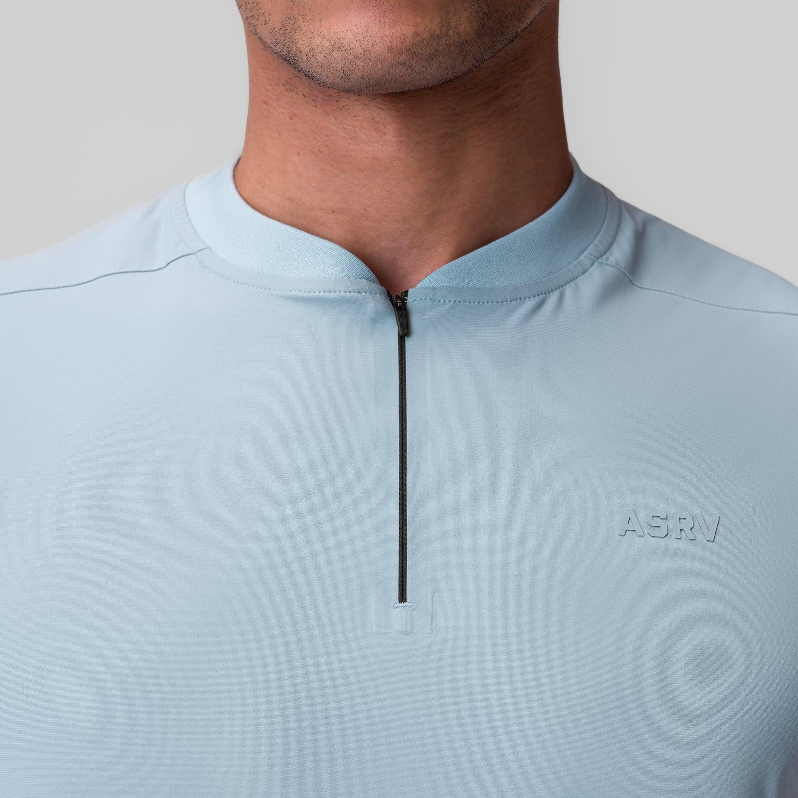 1087. Tetra-Lite® Ice Zip Tee - Light Sky Product Image