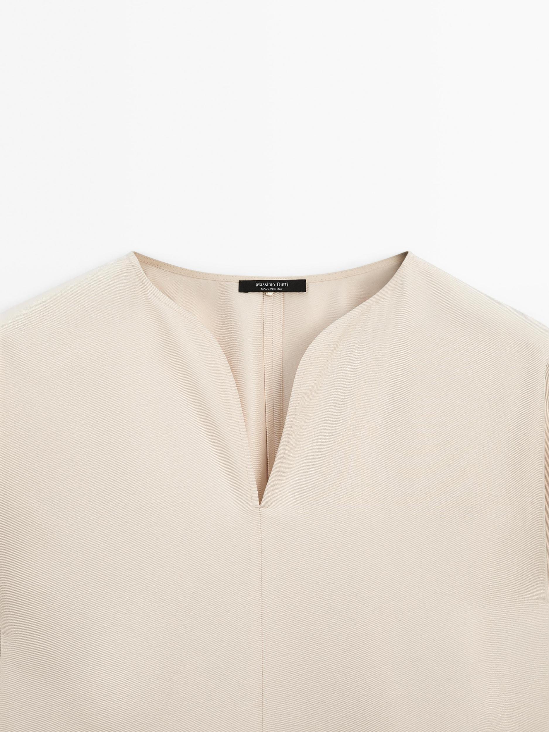 Flowing blouse with slit details Product Image