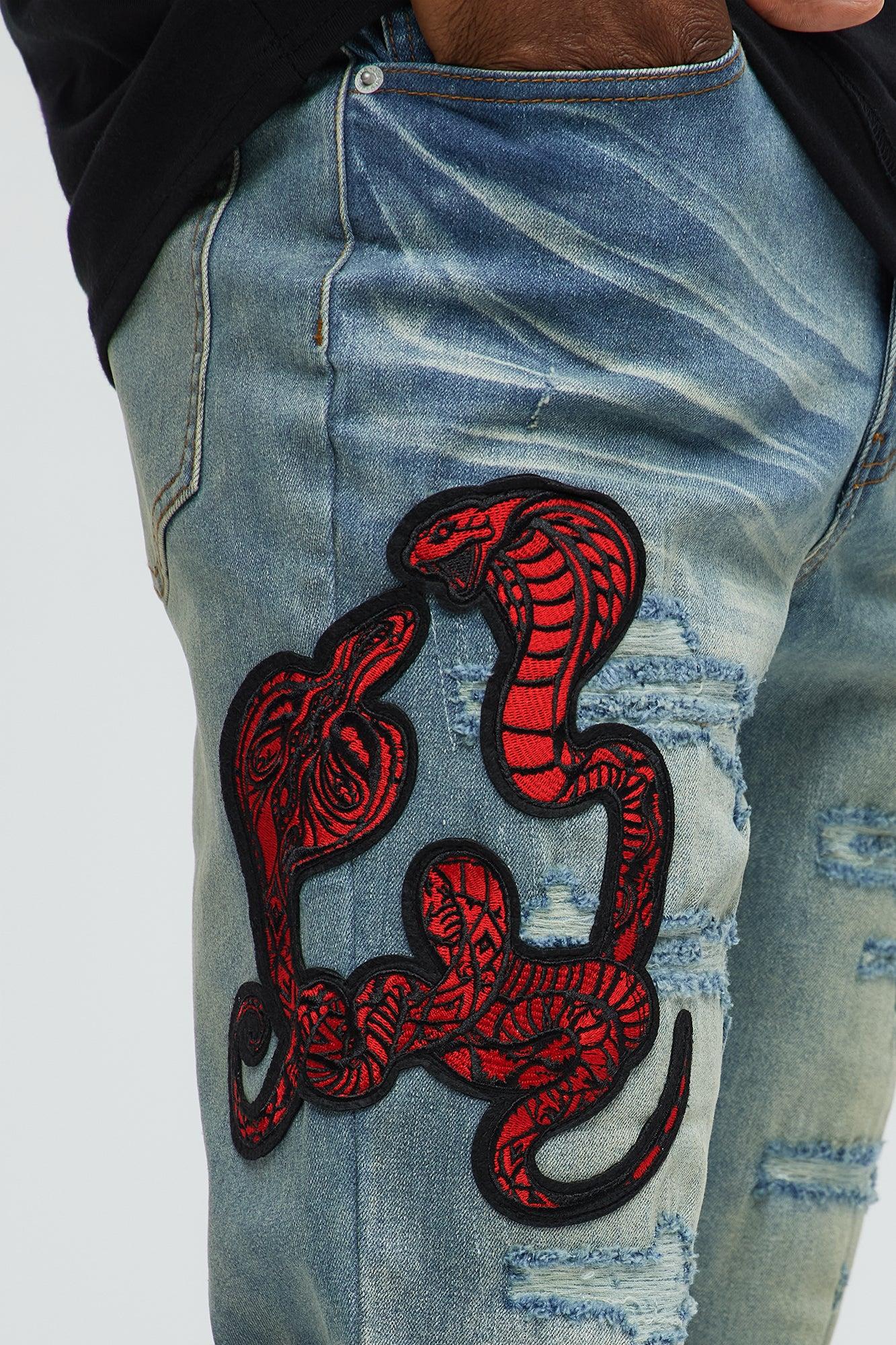 Side Snake Rip And Repair Stacked Skinny Jeans - Vintage Blue Wash Product Image