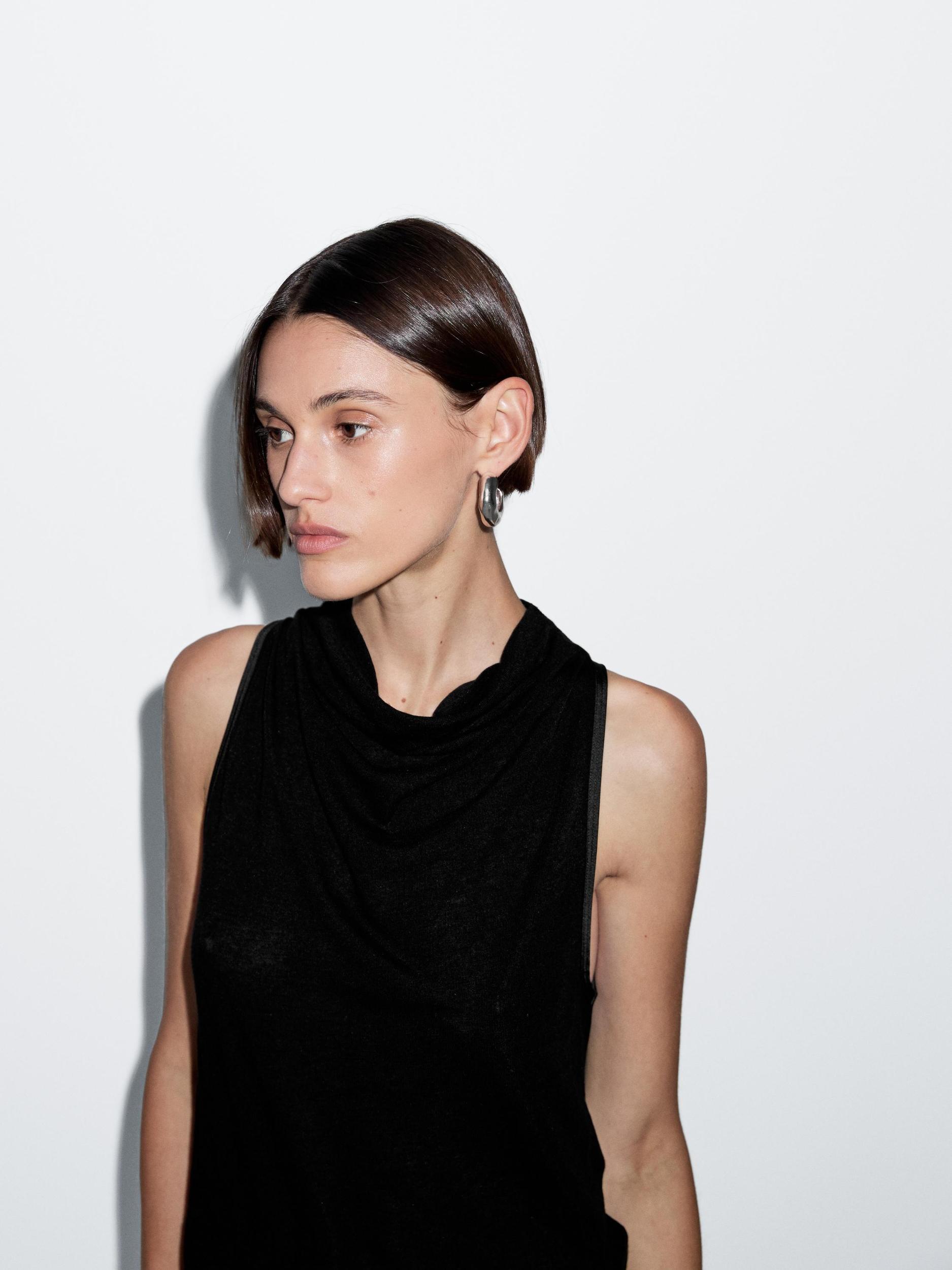 Sleeveless top with draped neckline Product Image