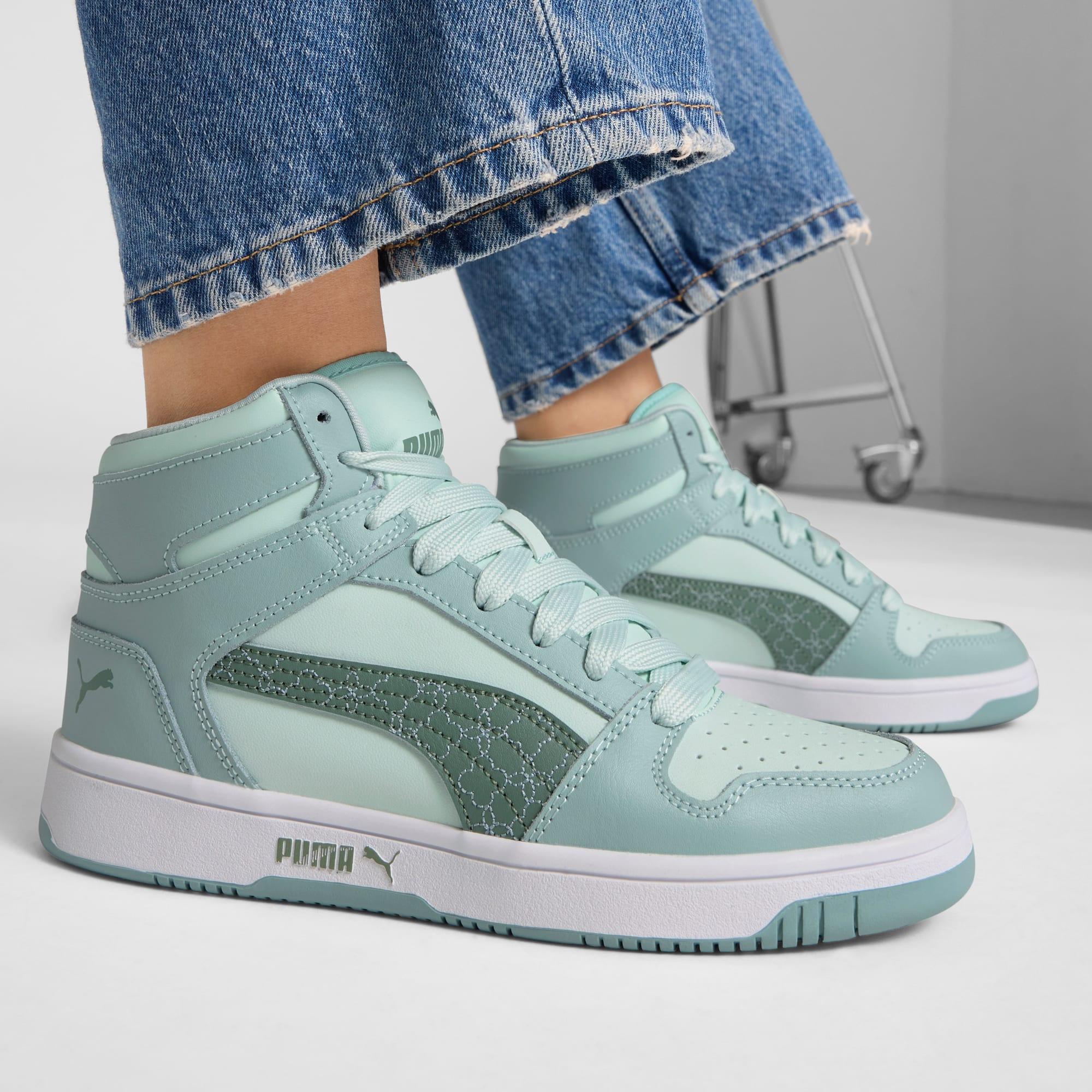 PUMA Rebound Layup Rebel Women's Mid Sneakers Product Image