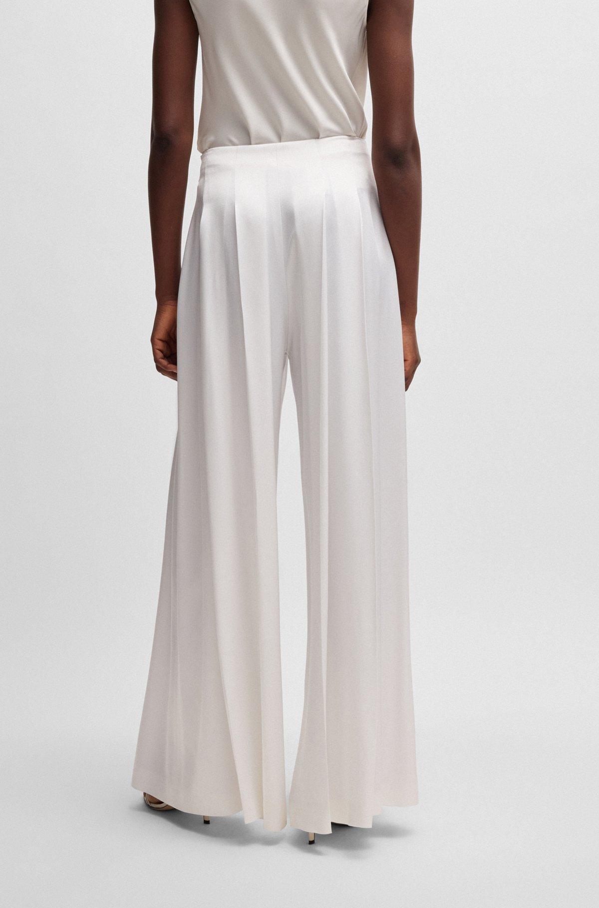 Relaxed-fit trousers with front pleats Product Image