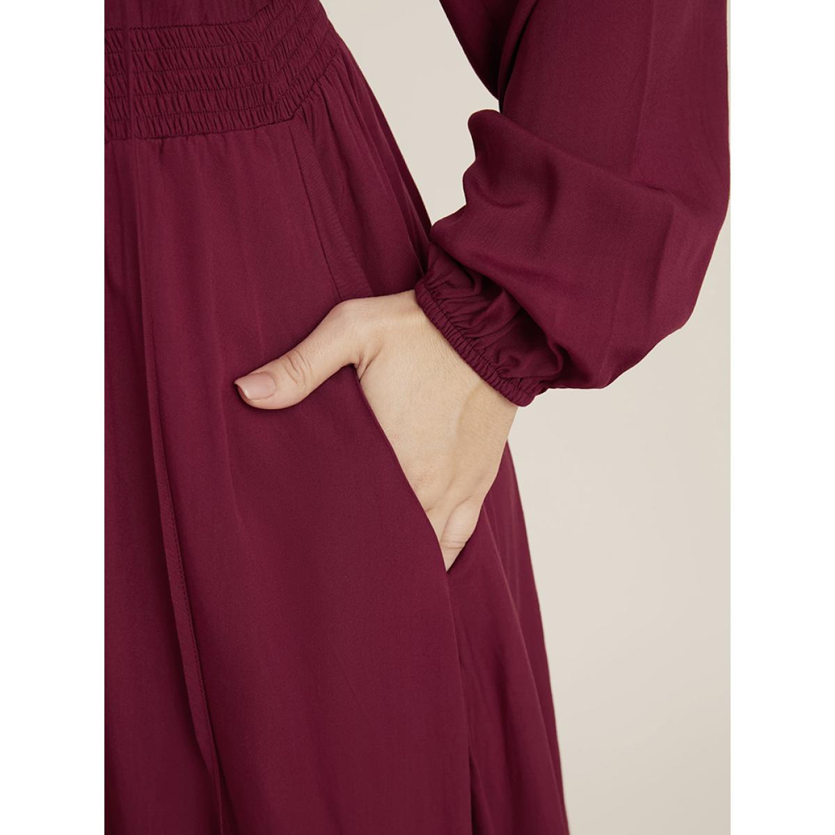 Plus Size Solid Pocket Button Detail Tie Neck Shirred Ruffles Dress Burgundy Women Elegant Pocket V-neck Long Sleeve Curvy Midi Dress BloomChic 14-16/1X Product Image
