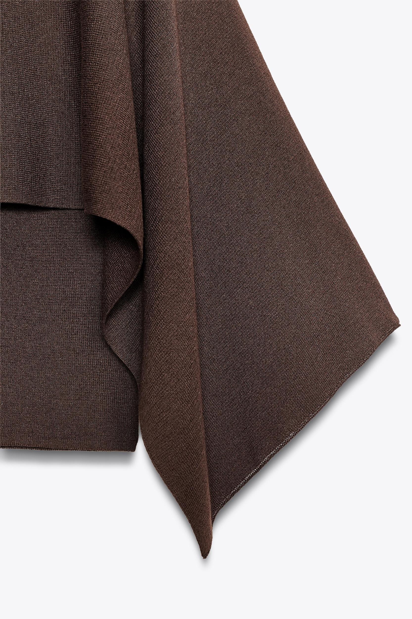 KNIT CAPE TOP Product Image