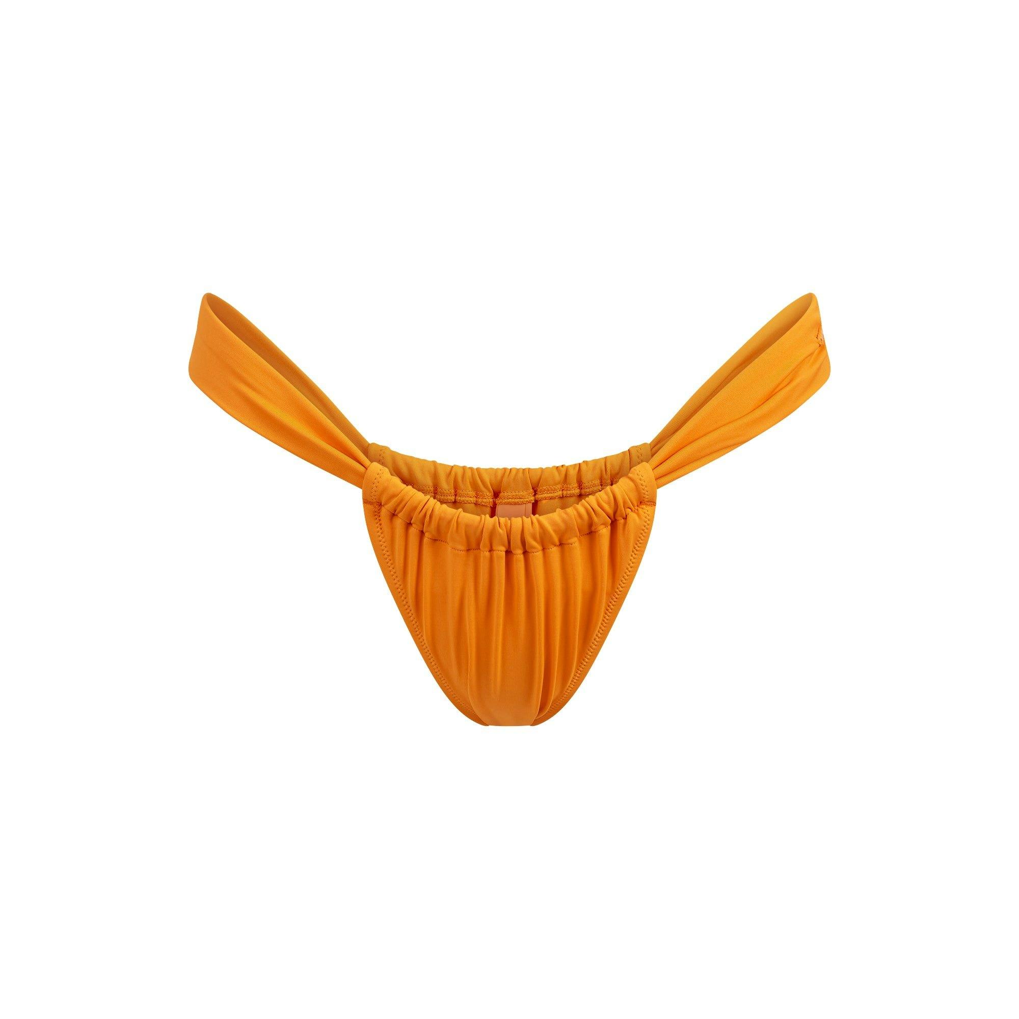 SIGNATURE SWIM RUCHED THONG BIKINI BOTTOM | TANGERINE Product Image