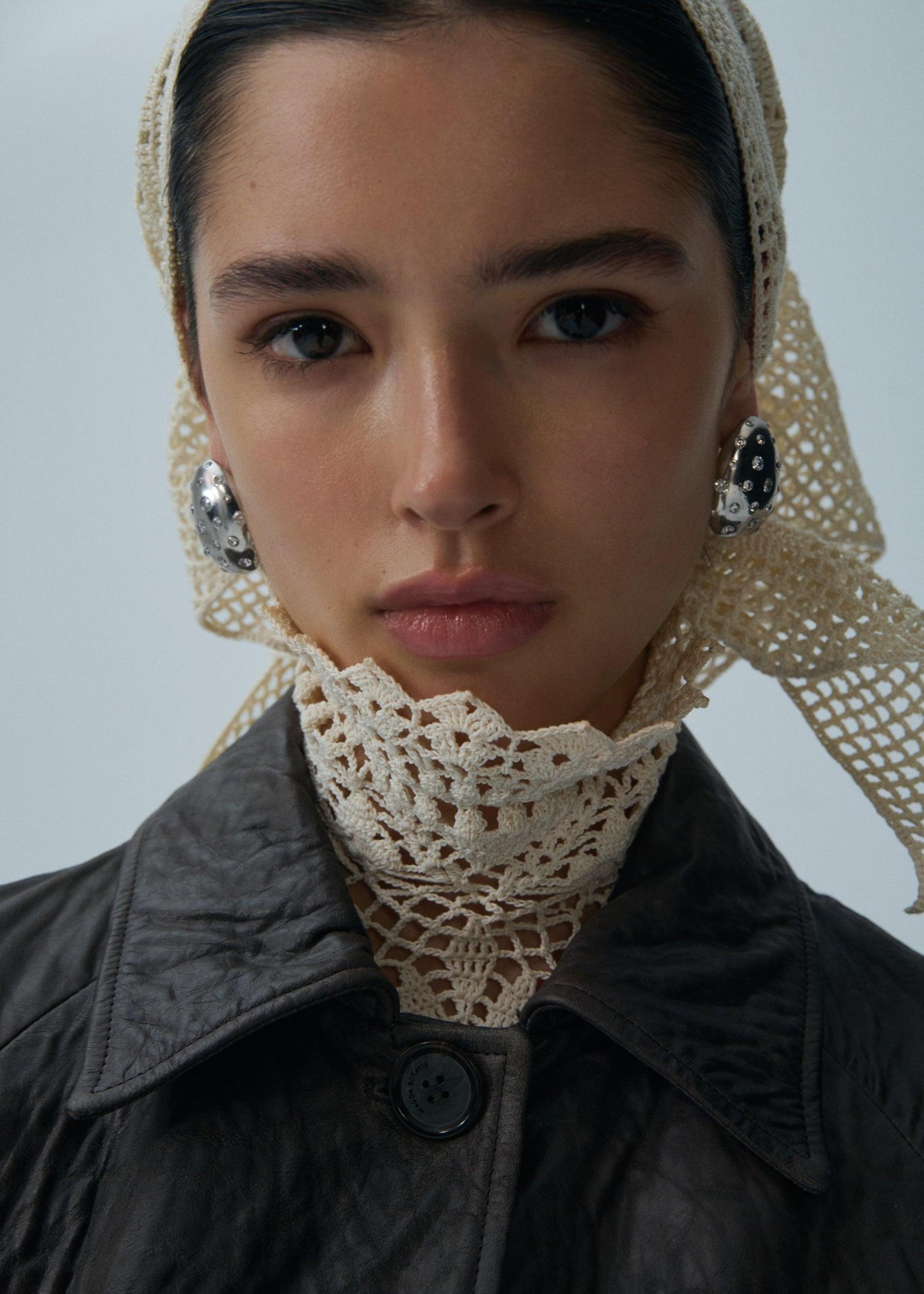 Crinkled leather belted coat in brown Product Image