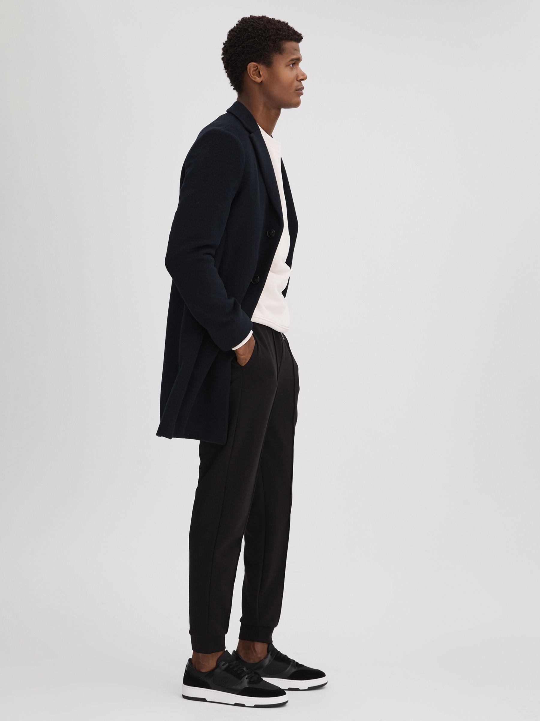 Unseen Leather Suede Noirmont Trainers in White/Black Product Image