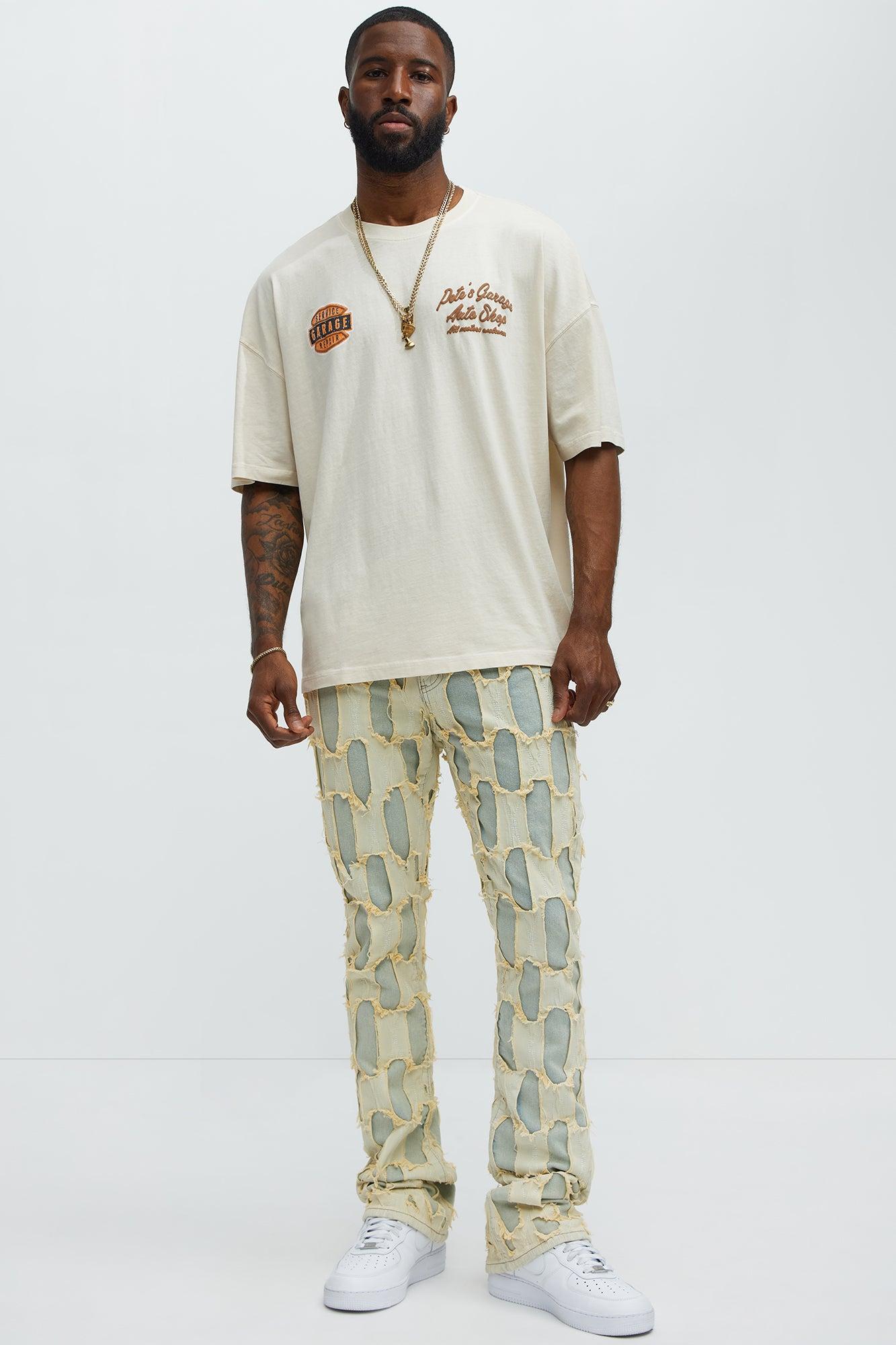 Shredded Distressed Stacked Skinny Flare Jeans - Medium Wash Product Image