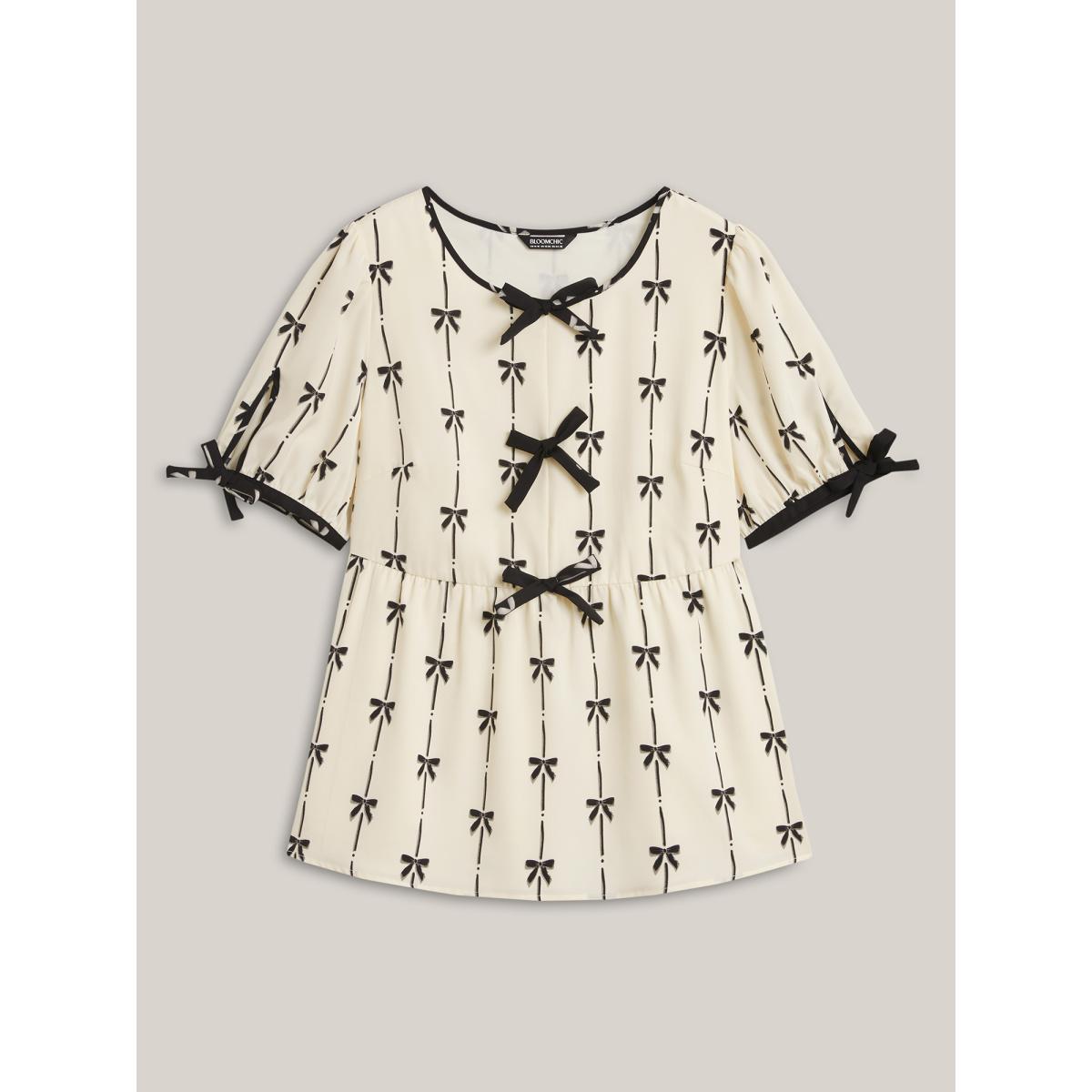 Plus Size Beige Bow Detail Printed Color Contrast Blouse Women Romantic Half Sleeve V-neck Elegant Blouses BloomChic 30/6X Product Image